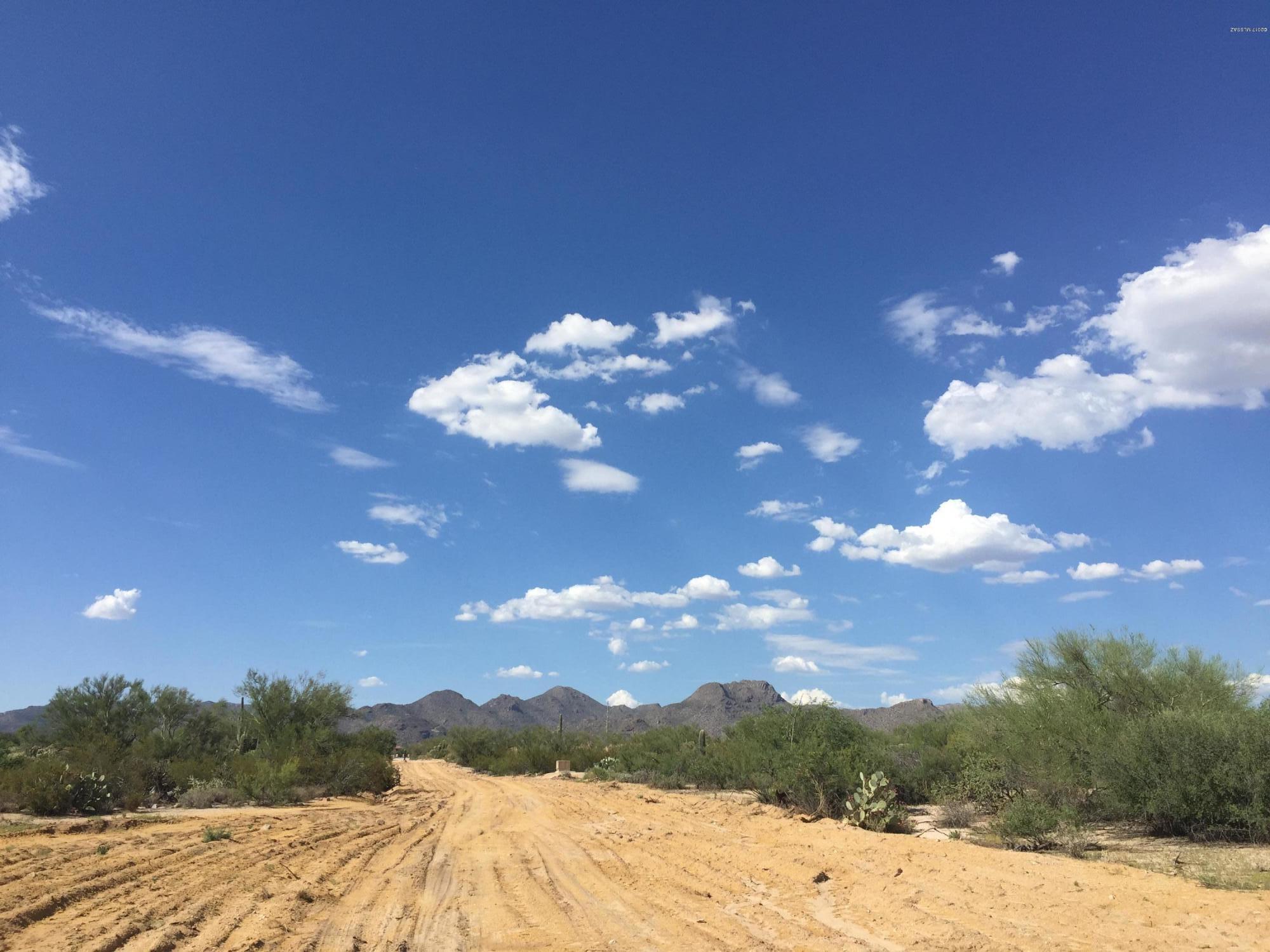 DOVE MOUNTAIN DELIGHT!!
4 acres of breathtaking views of the Catalina, Tortolita, And Santa Rita Mountains. Delectable dining world class shopping, and Ritz Carlton golfing minutes away. All utilities are on the land, and a dream pad awaits. This unique property can be used as a horse property, a small modular home community, a place of worship and more. There are tons of options for a custom home to be built, or an investment to be made.