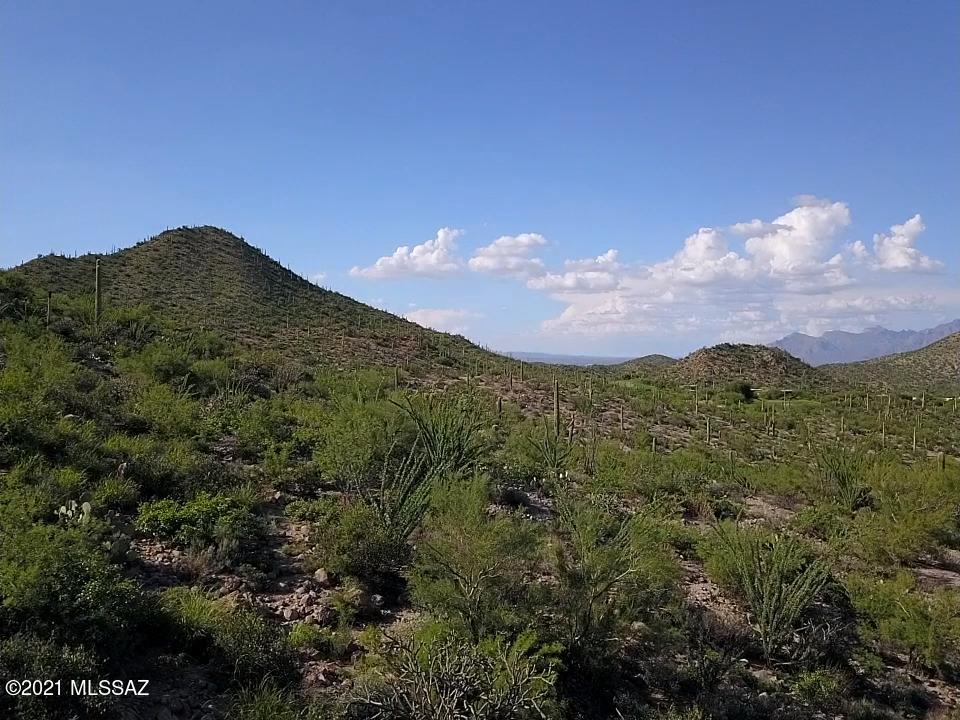 Wildcat Pass is a private, quiet, starlight escape. Surrounded by the Tucson Mountain Park, the area provides beautiful mountain views, 62 miles of hiking trails, walking distance from the J.W. Marriott at Star Pass, 15 minutes from the University of Arizona, 10 minutes from downtown and the mercado district. Lot 11 provides stunning mountain and city views, the property sits at 2650 ft in elevation, one of the highest lots in the neighborhood. Connected to all utilities including sewer, this is the lot your dream home is missing! **Membership initiation fees waived for any membership at the J.W. Marriott at Star Pass**