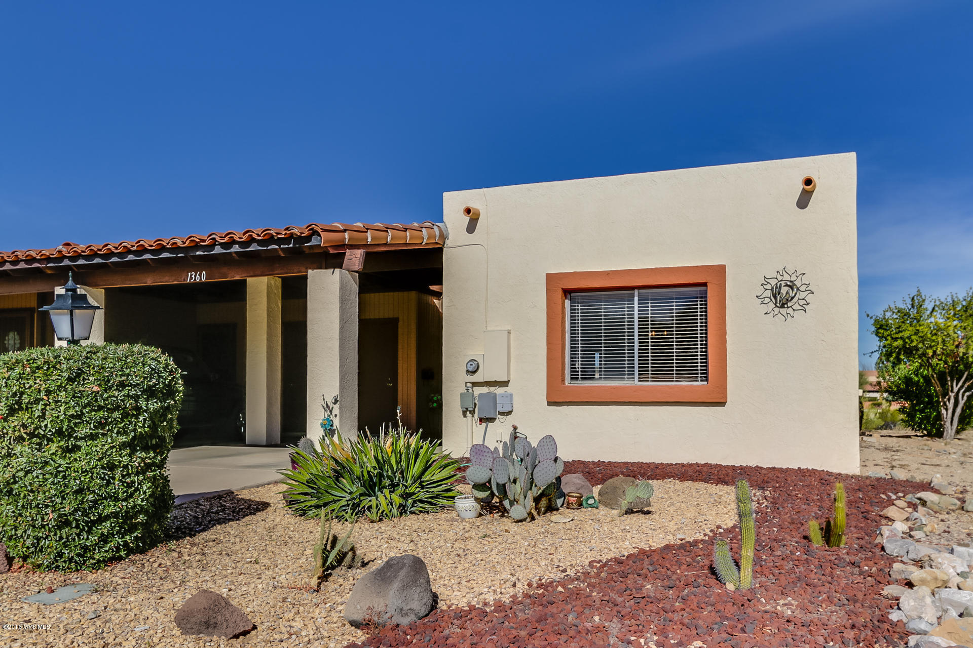 This is a Terrific 1026 Sq. Ft. 2BR/2BA end unit townhouse in Desert Hills just walking distance from the recreation center. The living room is open to the dining area and kitchen with an attractive white built in entertainment center. The Arizona room functions well as an office or studio with pleasant desert views and no rear neighbor. The home offers carport parking and has a convenient guest lot across the street. The furniture is available, so you can be moved in and settled early in the new year!