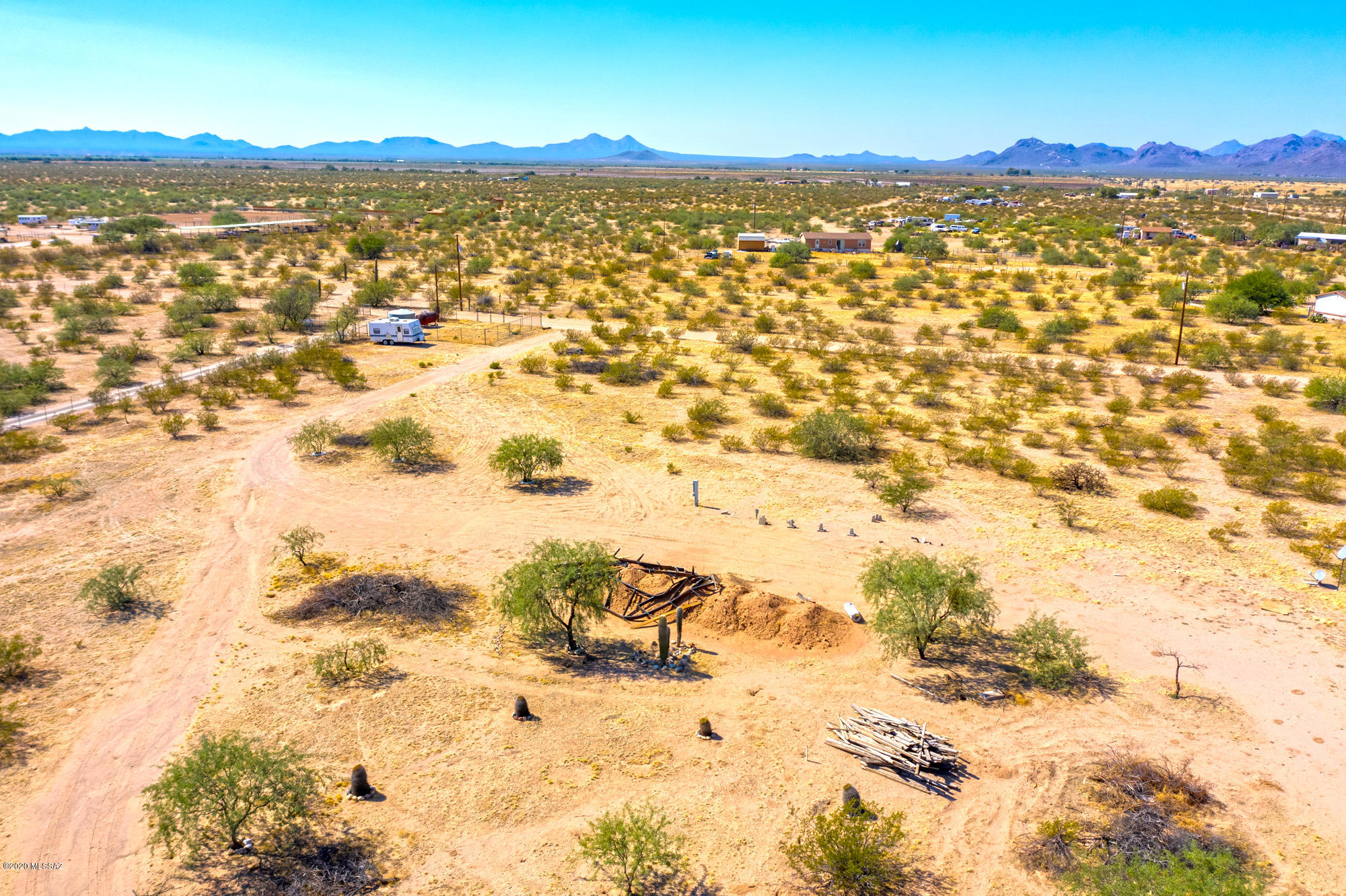 Perfect site for your dream home. Utilities included! Unobstructed, panoramic views on over 10 acres of land in peaceful Picture Rocks. The natural desert surroundings offer an abundance of privacy. Horses allowed! This quiet location will have you feeling like you are a world away, yet close enough to your daily conveniences.