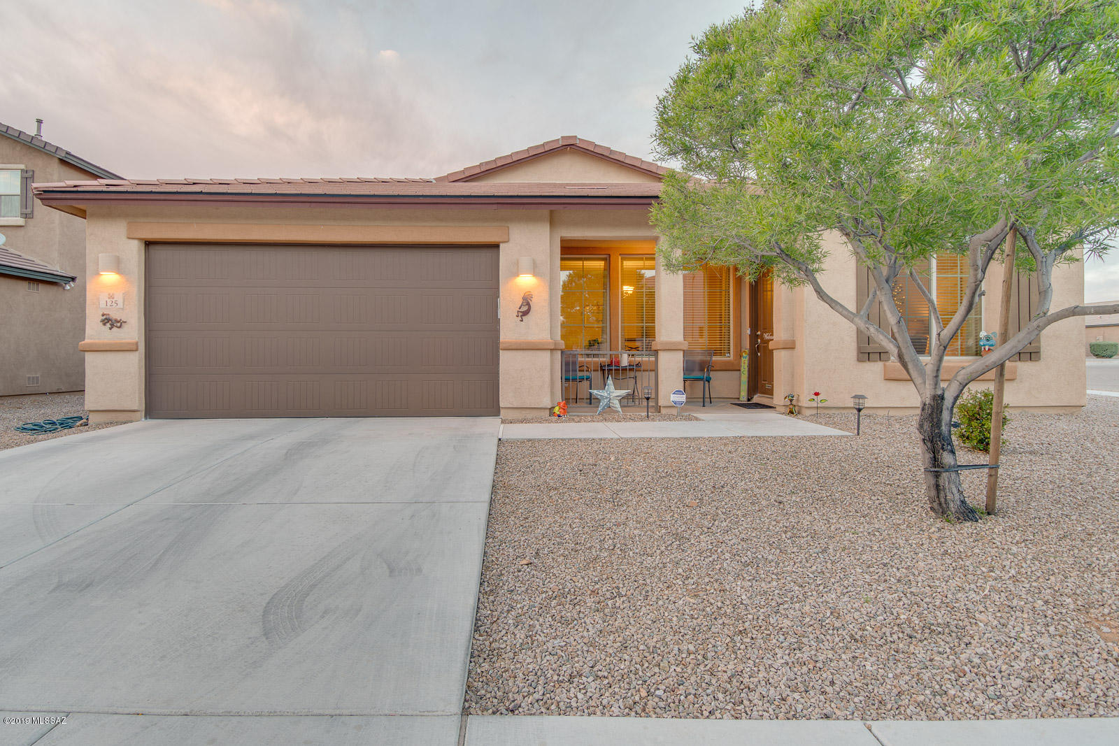 This Home is well taken care of.  On a Very Nice Corner  - Awesome Split Floor Plan with Plenty of Room to Stretch Out - 25 Minutes from Davis-Monthan AFB and Rita Ranch Shopping Complex is growing fast. - Just some of the Upgrades Include High End Ceiling Fans - Gas Bib on the Covered Back Patio - upgraded garage door opener to name a few - And of Course the Obvious - Located in in Highly Desired ''Vail School District''