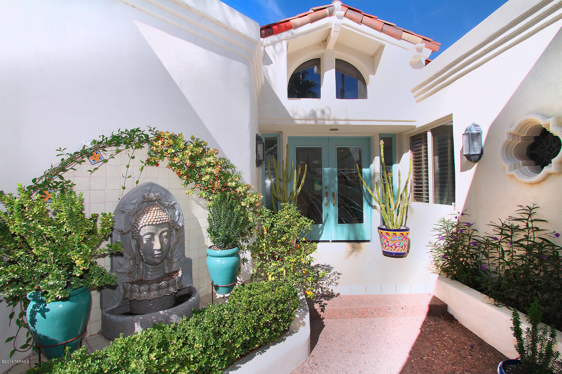This is the ORIGINAL EL DIAMANTE TOWNHOME MODEL, designed by RICHARDSON NAGY MARTIN of NEWPORT BEACH, CA. & BUILT by HARBOR SOUTHWEST DEVELOPMENT of SCOTTSDALE, AZ, is a prize 2 BEDROOM + DEN and sets on  the 8TH FAIRWAY of SKYLINE COUNTRY CLUB with UNOBSTRUCTED MOUNTAIN VIEWS. DRAMATIC HIGH CEILINGS, LIGHT, BRIGHT OPEN FLOOR PLAN. SPACIOUS MASTER BEDROOM SUITE, GOURMET KITCHEN features CORIAN COUNTERS & ST. CHARLES CABINETRY. BEAUTIFUL COURTYARD ENTRY. LUSH PATIO. LOTS of WINDOWS, ARTFULLY STAINED GLASS ENTRY & CUSTOM SHUTTERS. Great home for ENTERTAINING. Enjoy TUCSON LIVING at ITS BEST. A PLEASURE to SHOW!!.