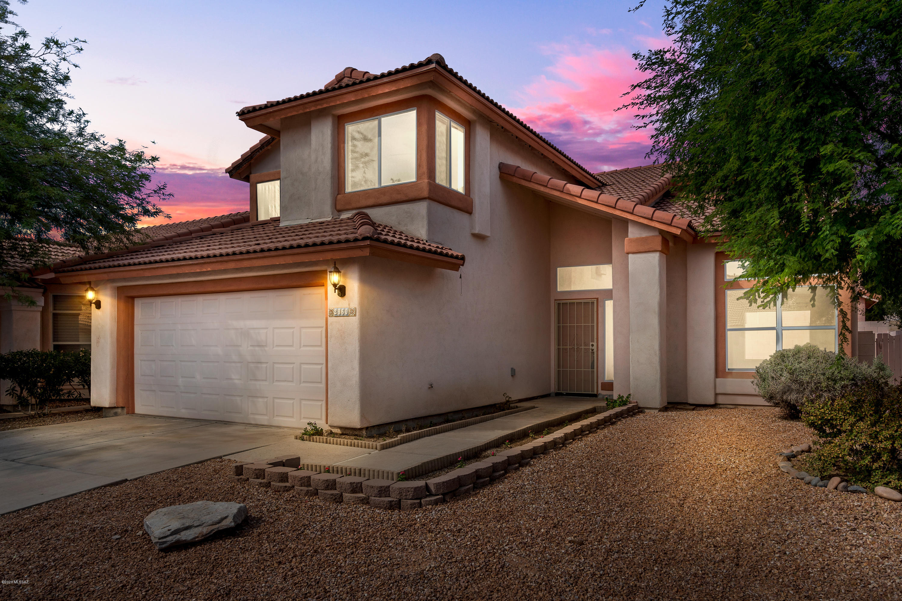 This charming North Ranch home features soaring ceilings in great room, fans in every bedroom, stainless steel appliances, easy care hard flooring throughout.  Just repiped, no poly!  Newly redone porch roof, new tile in master shower. Neighborhood offers all the amenities you could want including a pool, spa and tennis courts.  Move-in ready, act quick before this one is gone.