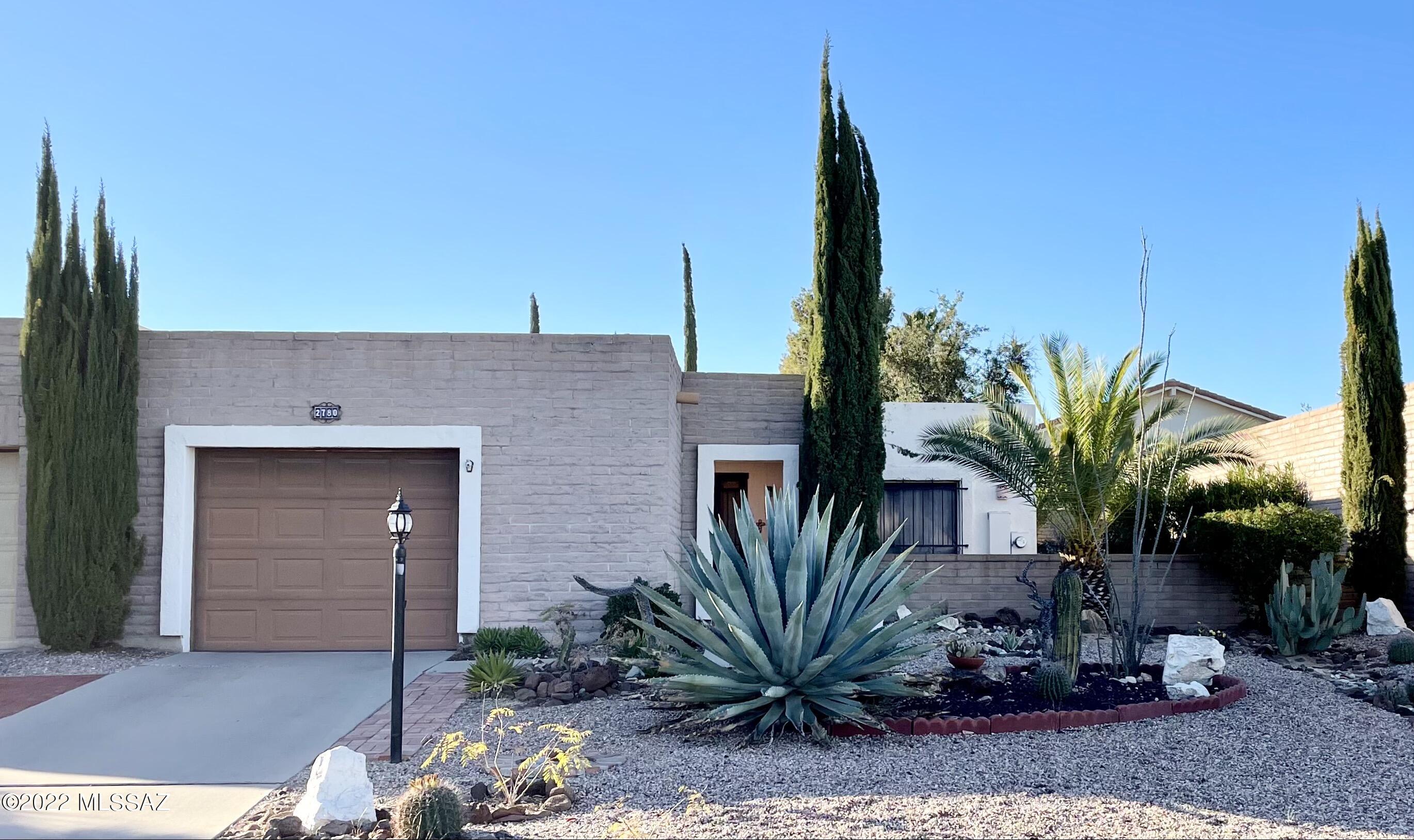 Enjoy the beautiful mountain views from your front facing patio. Bright cheerful and spacious, this townhome offers 1697 SQFT, 2 Bed 2 Bath plus an oversized bonus room, 1 car garage containing a storage.  Recently painted interior & exterior with a new AC in  2020. This home is ready for you to move right in. Motivated Seller willing to entertain a reasonable offer.  Call to make your showing appointment today!