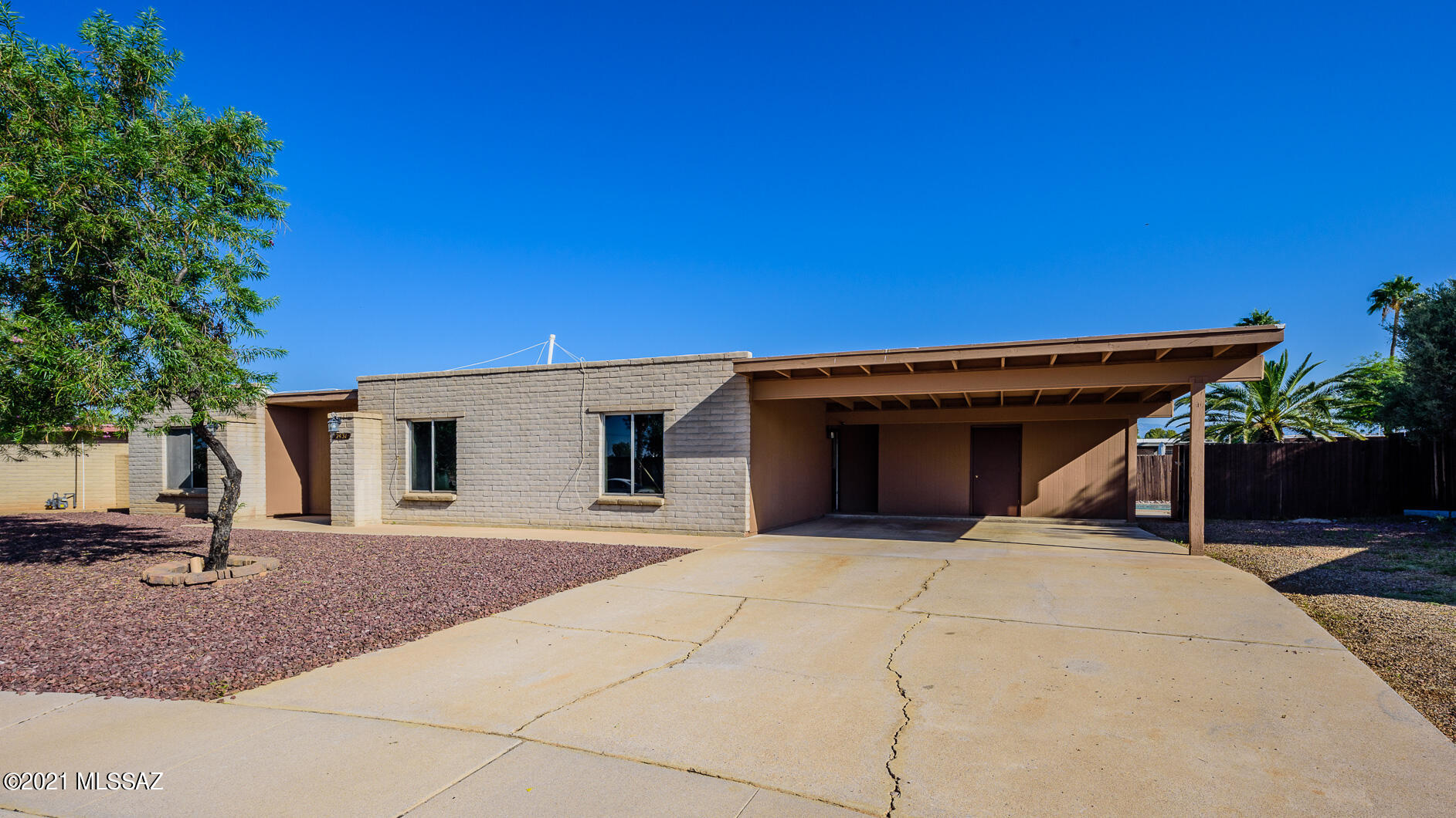 This is your new home!! Enjoy this spacious 1862 Sq Ft, 3bd/2ba beauty in a cul-de-sac that has it all!! Oversize tile flooring and tasteful carpet welcome you into the space with a cozy fireplace in the family room, bonus Az room off family room, skylights, upgraded vanity and tile counter and shower in master, upgraded vanities and granite in hall bath, spacious kitchen space with formal dining area and extra dining space, central AC, large laundry room and storage sheds with electricity give an added bonus to this home.  Enjoy the sparkling pool and large yard space for entertaining!  This a conveniently located Eastside property minutes from shopping, dining, Raytheon, Davis Monthan AFB, I-10 access, Amazon fulfillment center and more!!
