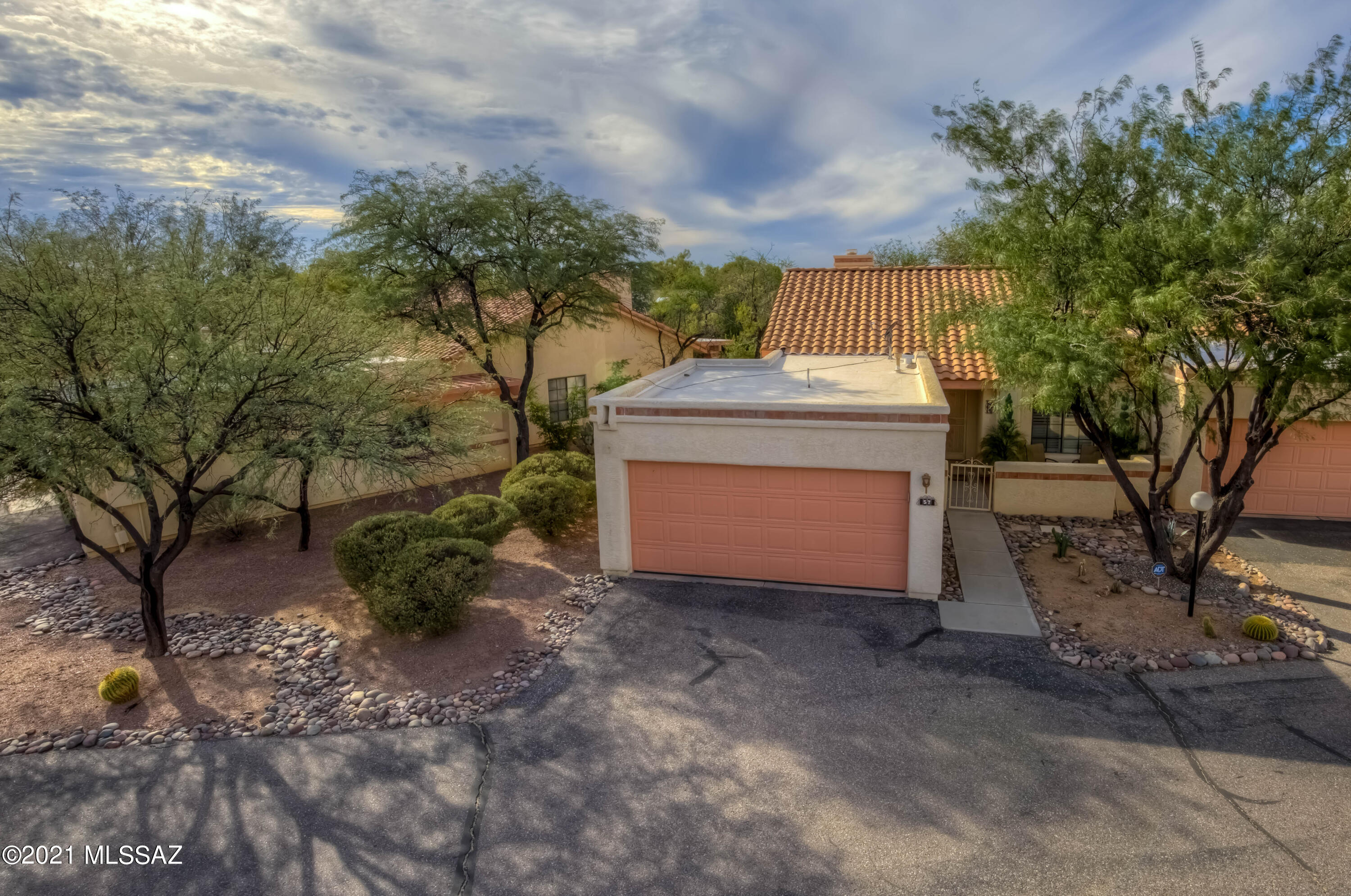 Fantastic location within Oro Valley. Stunning Mountain views from the front patio.  This charming 3 bedroom 2 bath and 2-car GARAGE condo is close to golf, shopping, dining and medical. Completely updated. New HVAC, Water Heater, Water Softener, New Kitchen Appliances, & Remodeled Kitchens and Bathrooms. Perfect for seasonal visitors or full time resident. Enjoy the resort style pool and spa without the fuss keeping it clean. Beautifully updated with new cabinets, granite counters, fresh paint and more. Showings are only 1pm-6pm daily.