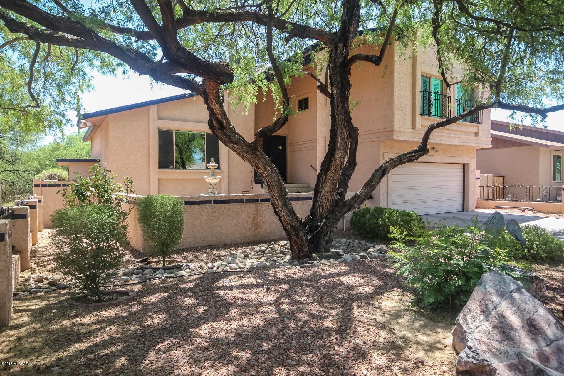 **RANGE PRICED $260K TO $270K DEPENDING ON TERMS**  Fabulous location tucked away in a quiet culdesac neighborhood.  Resort like East facing backyard with pebble tec pool, real grass, covered patio, built in gas BBQ, mature fruit trees and backs to green belt.  Updated windows, new carpet, wood flooring upstairs with formal living spaces plus family room.  A true gem minutes to parks, the Loop, shopping, restaurants and bus lines.  Must see this one.