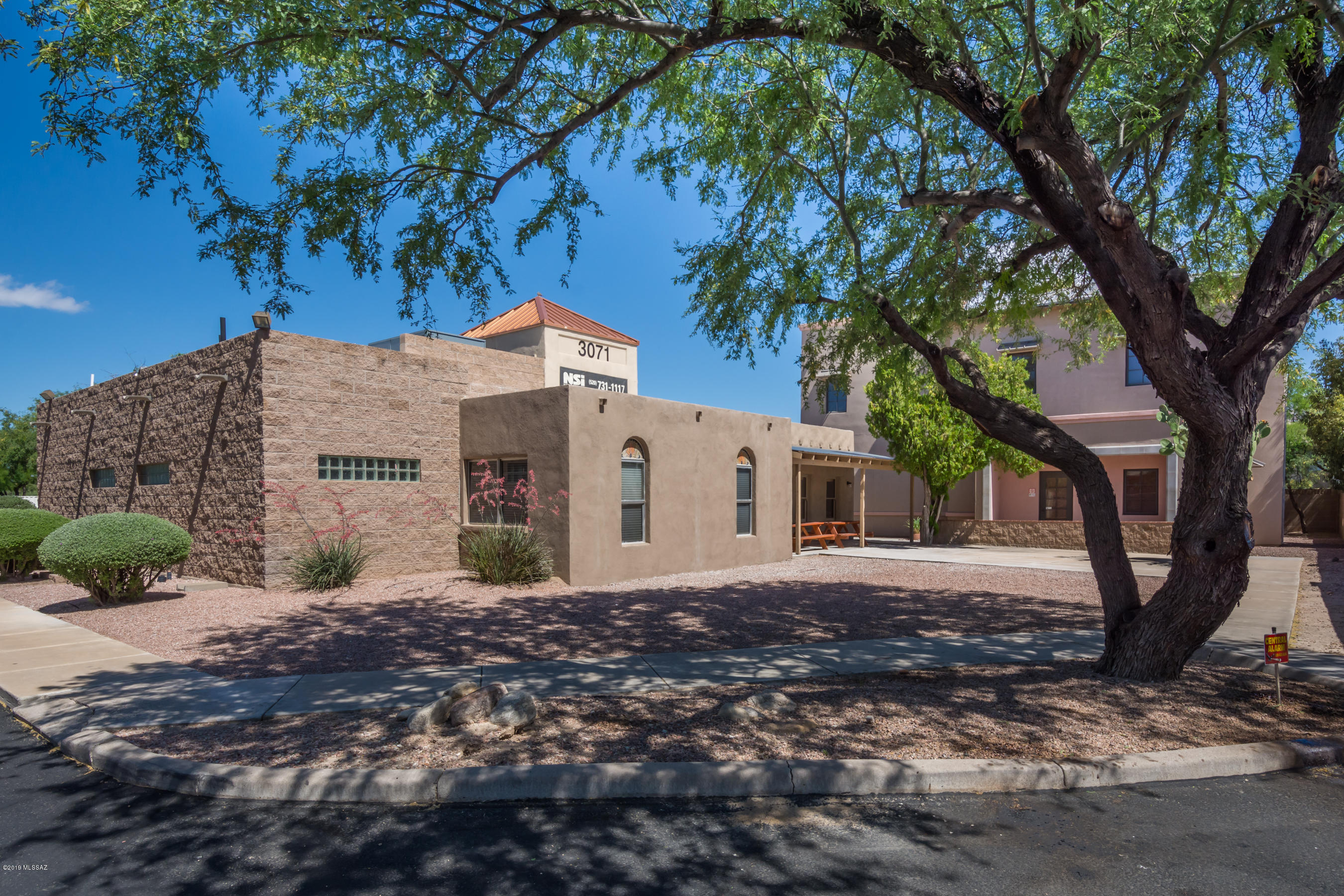 This fabulous office complex boasts location, condition, great parking and flexibility.  It is presently occupied by a single user but with two buildings and one having two floors, it also lends itself to 3 separate tenants or 30-individual office suites with common reception, conference rooms and other facilities (see floorplans attached). The larger building is 5,077 SF built in 2008 and is ADA compliant with elevator.  Storage container in parking lot and Separate parcel (#110-05-3160) with wellsite shall convey with property.   **Additional financial data coming soon**