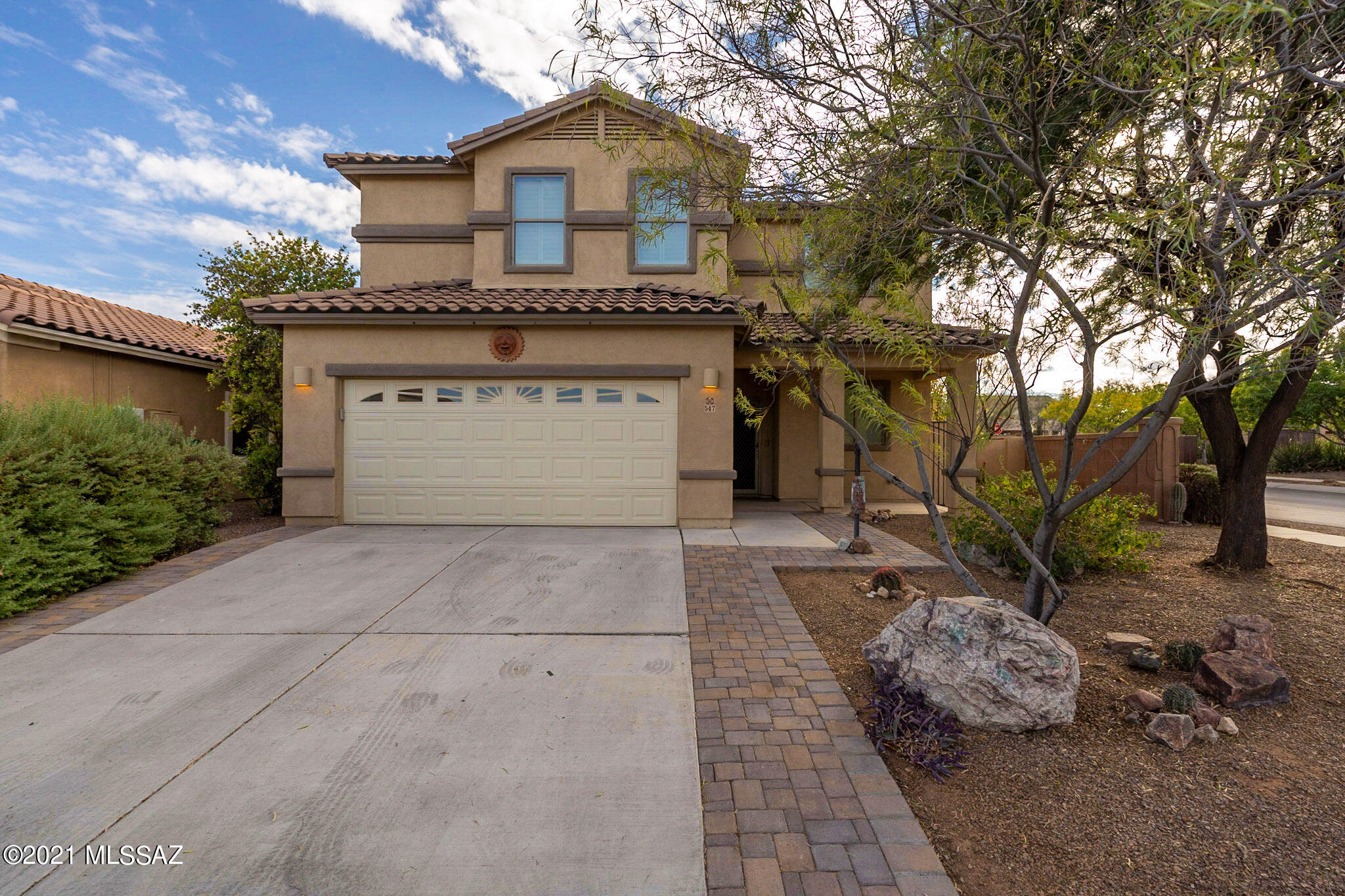 This wonderful move in ready immaculate 4 bedroom 2 story home with an office/den on a corner lot adjacent to park.  Wonderful, spacious kitchen is open to living area and has tons of counter space! Plantation shutters  and UV screens throughout. Beautiful patio with lit pergola, Great space for entertaining with tons of  patio pavers, outdoor BBQ and mature shade trees.  All appliances stay including matching front loading washer/dryer. Located in Rancho Sahuarita which is a premier community that has something for all ages.  Award winning builders in this master planned community which offers endless amenities. that includes: 3 pools, a splash park, also 11 separate parks, hiking and cycling trails.   Just twenty minutes from Tucson yet Rancho Sahaurita has everything you need.