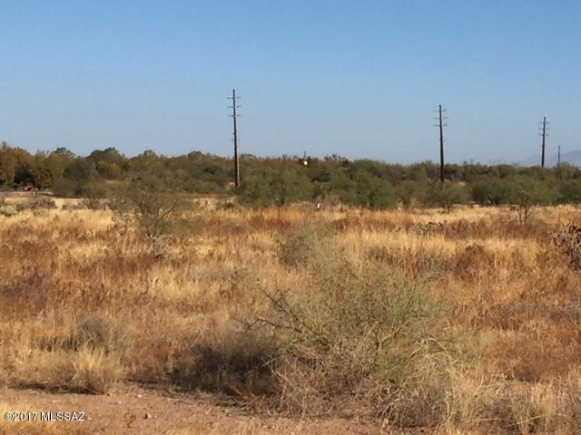 Motivated seller!  Owner financing available.  Great opportunity to own a beautiful building site (2.13 acres) in exclusive Colonia real, a scenic subdivision with 100+ acres of conservation area situated at the foothills of Madera Canyon! Located conveniently to schools, shopping, medical facilities, and all of the Green Valley amenities! Choose your own custom home builder. Non-age restricted, with underground utilities and cable/internet available.