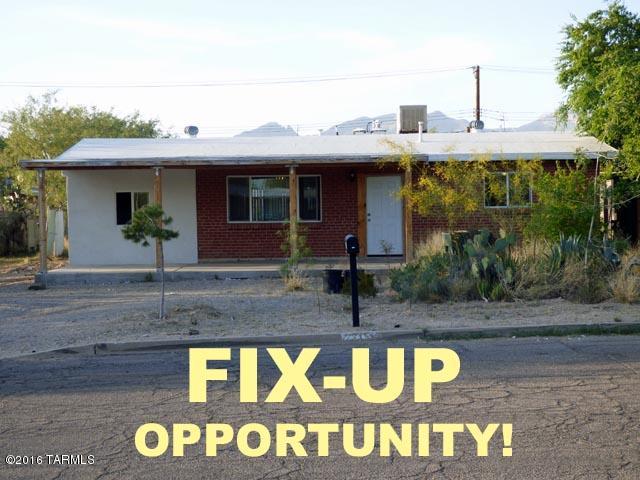 Three years ago my uncle bought this FIX-UP, repaired the roof, tore out the kitchen & the master bath, took up much of the flooring, enclosed the garage for a third bedroom, had a gorgeous new covered front patio put in, started installing the granite countertops, and then he died in the hospital, leaving the rest of the renovations for the next owner to complete. Some receipts for all of the work thus far. Conveying with the house are stainless steel sinks, flooring for the great room, a granite countertop for the master bathroom & 2 stoves. Yes, the front door was installed backwards. Yes, the master bathroom is rather bare at the moment, the kitchen still needs a lot of work, and the doorway & ventilation into the third bedroom still needs to be done.