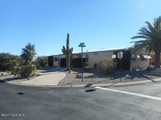 Large Corner Lot. Spacious3 bedroom, 2 bath home with side by side 2 car carport. Split floor plan, family room off kitchen. Formal Dining Room and Living Room. 3rd bedroom can be used as office/computer/craft room. This home offers a lot for the price. Workshop/storage. Low care landscape. HOA Fee ($55.00 month) includes clubhouse, heated pool and spa, library, meeting room, exercise room, pool table, horseshoes courts, shuffleboard, ceramics, crafts, card games, bingo, weekly trash pick up and road maintenance. Great location, close to restaurants, churches, golf courses and medical facilities.