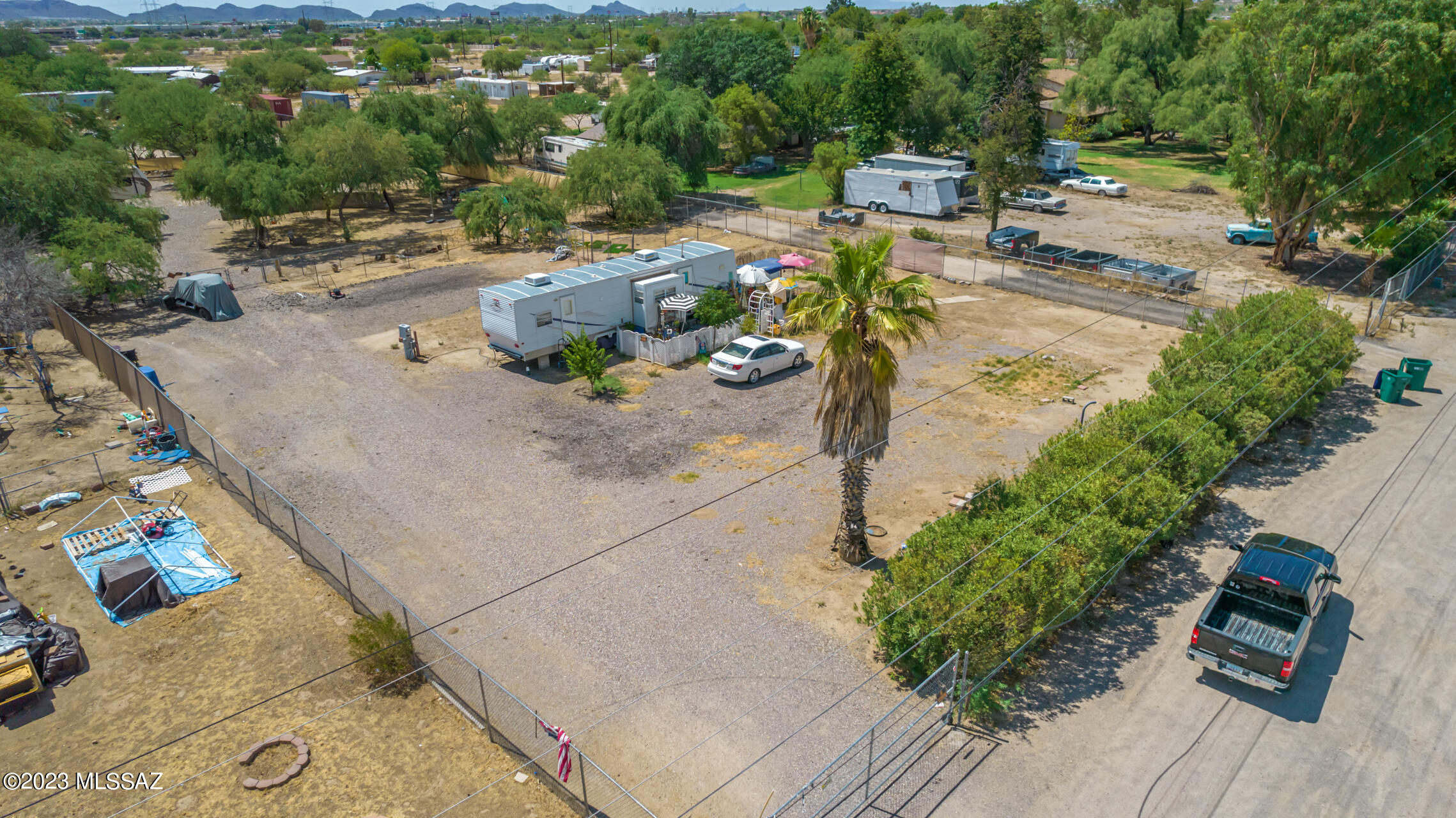 Excellent opportunity to own this lovely horse property! Fully-fenced value, nestled on an almost acre lot, including 2 functional septic tanks and a shared well. West facing will certainly provide so much potential to add your personal touch and make it your own. Tons of space for your trucks, toys, and animals! If you are looking for a holiday retreat or a minimalist lifestyle, this one is a great choice! Ask your agent about the 2017 Forest River Wildcat Travel Trailer RV available for purchase!