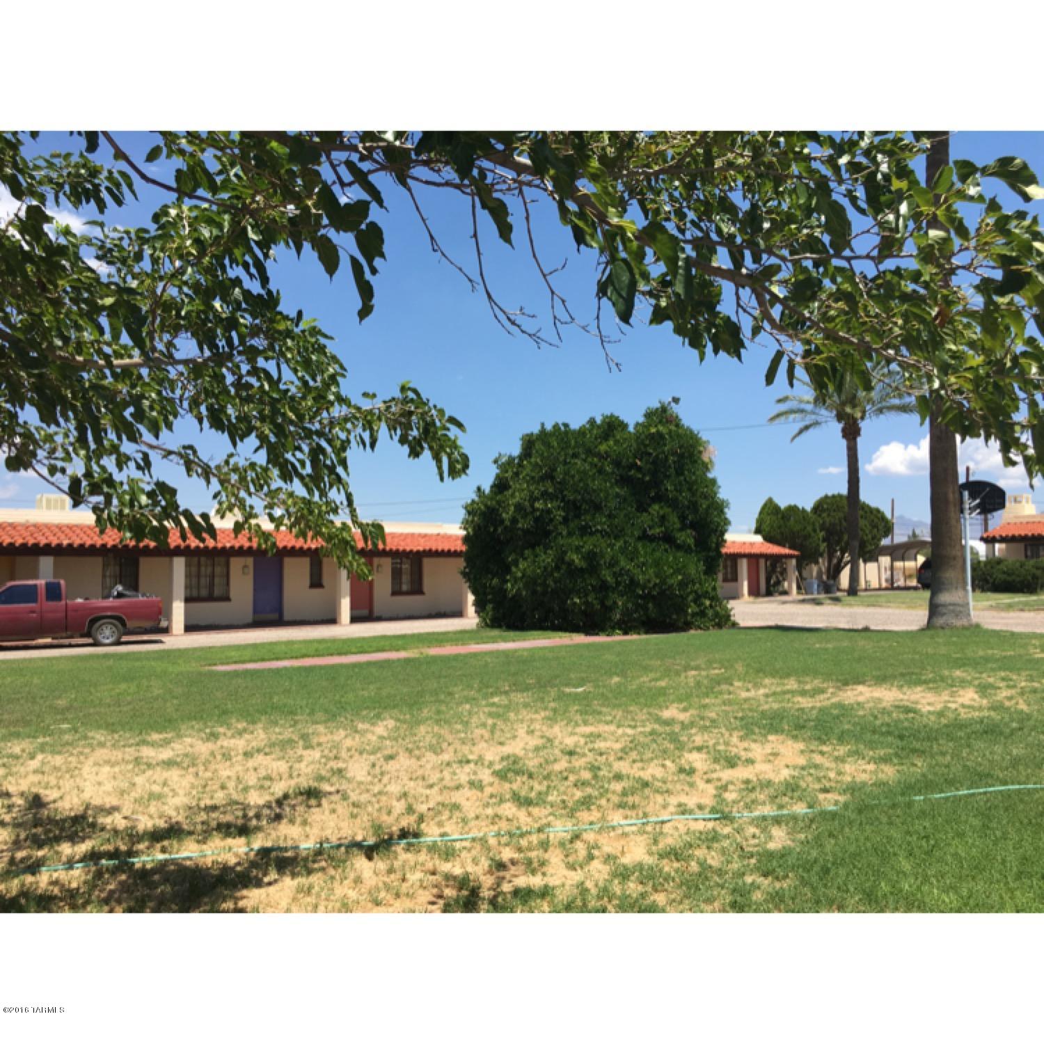 Great opportunity for ambitious  Buyer. 15 studios with kitchens and bathrooms and 10 one room motel rooms each with a bathroom. Plus 2 BD house + 2400 square foot 3 bd. 2 ba. living quarters/office. Studios currently rented for  $209.00 weekly. 6 motel rooms that probably could be turned into 3 apartments. Potential of 18 studio apartment units. Market rent for studios approx. $430 on a monthly basis. Gorgeous grounds with fenced pool. This property is also ideal to be repurposed into a group home, board and care, halfway house, shelter, elderly housing or a non profit facility. Recent bid of $55,600 to install fire suppression sprinkler system throughout.  All units have AC. Property is on well, but property has Ray water meter. Suntran # 26 bus line stops in front of property.