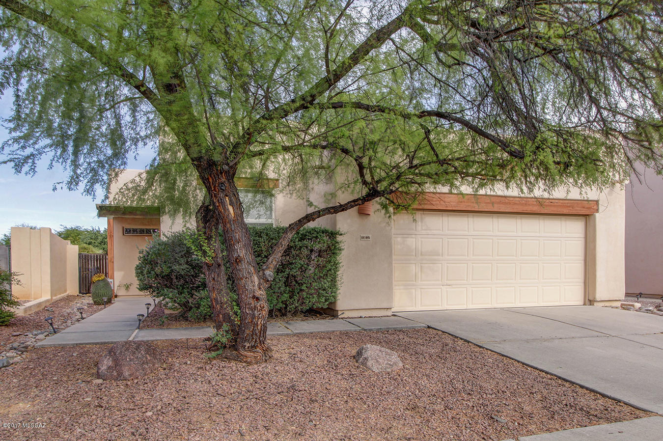 Great location in Copper Creek, close to parks, library, country club, restaurants, shopping and Catalina State Park. This great room floor plan is open to the kitchen and includes vaulted ceilings, an abundance of windows for lots of natural light, plant shelves, cozy gas fireplace for the holidays, ceiling fans, 3 bedrooms/2 baths, 2 car garage, and all on a pool sized lot with mountain views. Cooks kitchen features include desirable gas cooking, a large pantry, comfortable breakfast bar seating, skylight, and plenty of cabinet storage. The spacious master suite includes a walk-in closet, separate bath area, large linen closet, and separate from the other two bedrooms. This beautiful community is also close to Copper Creek Elementary School.