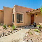 This spotless, pampered home is really beautiful and it is charming too. It is set in the coveted community of Sin Vacas.  Recent remodeling includes the bathrooms and the kitchen. It has an easy flowing floorplan and it is ready to move into.  Enjoy the gardens and the community area too.