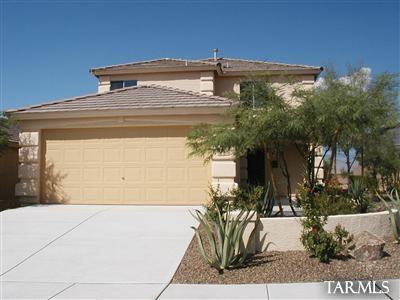 Former model 2 story home. Spacious floor plan features 4 bedrooms, a large bonus room and 2 full baths. Master suite is located downstairs, 3bedrooms, bonus rm & laundry upstairs. New carpet.  Ref, D/W, Disposal, Micro, Stove, W/D included. Ceiling Fans. Covered back patio. Low care landscaping.