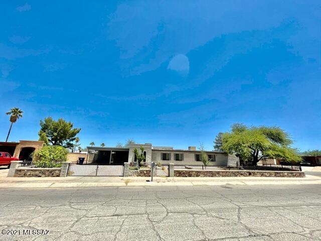 Property has many upgrades and features! Larger corner lot with front and rear carports for vehicles,
toys, storage(No HOA). Upgraded kitchen with granite countertops and newer stainless steel appliances
including washer and dryer that are also being offered. The owner enclosed a double car garage to
make an extra massive sunken master bedroom with master bath and walk in closet(no permits)with sq ft
discrepancies. Home also includes original master bedroom and bath with 3 additional bedrooms and
hallway bath. Custom exposed wood beam ceilings in sunken living room and back bedroom. Custom BBQ in
backyard with storage unit that conveys. Dramatic custom French door entry with custom tile
throughout. Home also features a workshop with beverage cooler that conveys. Wont last long!