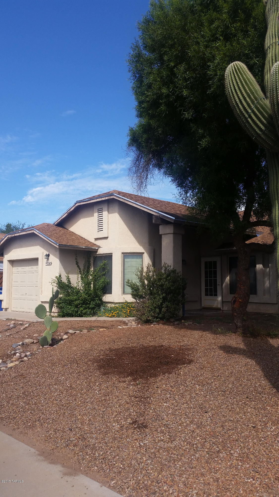 Charming home that is waiting for your special touches. It has a beautiful fireplace in the family room with an open floor plan that overlooks the kitchen and dining area. Wonderful location that will allow you to enjoy shopping, movie theaters & restaurants close by. Upgraded bathrooms, new refrigerator and dishwasher were recently installed.