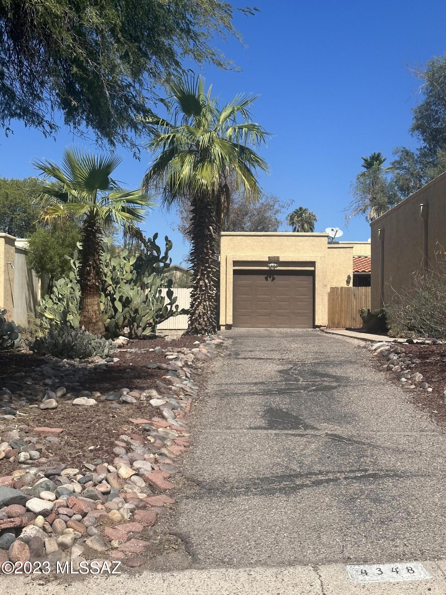 Wonderful 3 bed 2 bath townhouse on the northwest side of Tucson. Great room  w/ vaulted ceilings, new carpet, AC, & 1-car garage. Appliances include: refrigerator, oven/stove, and dishwasher. Huge, low maintenance, north facing backyard. Community amenities include: swimming pool, Jacuzzi, tennis court, and picnic area w/ grills. Application fee $30 per adult, Rent $1450 w/ 12 month min lease, security deposit $1600, pet deposit $200/pet w/ $20pet rent/month. Washer/dryer can be provided for $35/month. Landlord will verify the following application requirements: Current /recent rental history in good standing, No history of eviction, verifiable monthly income of at least 2.5 times rent.