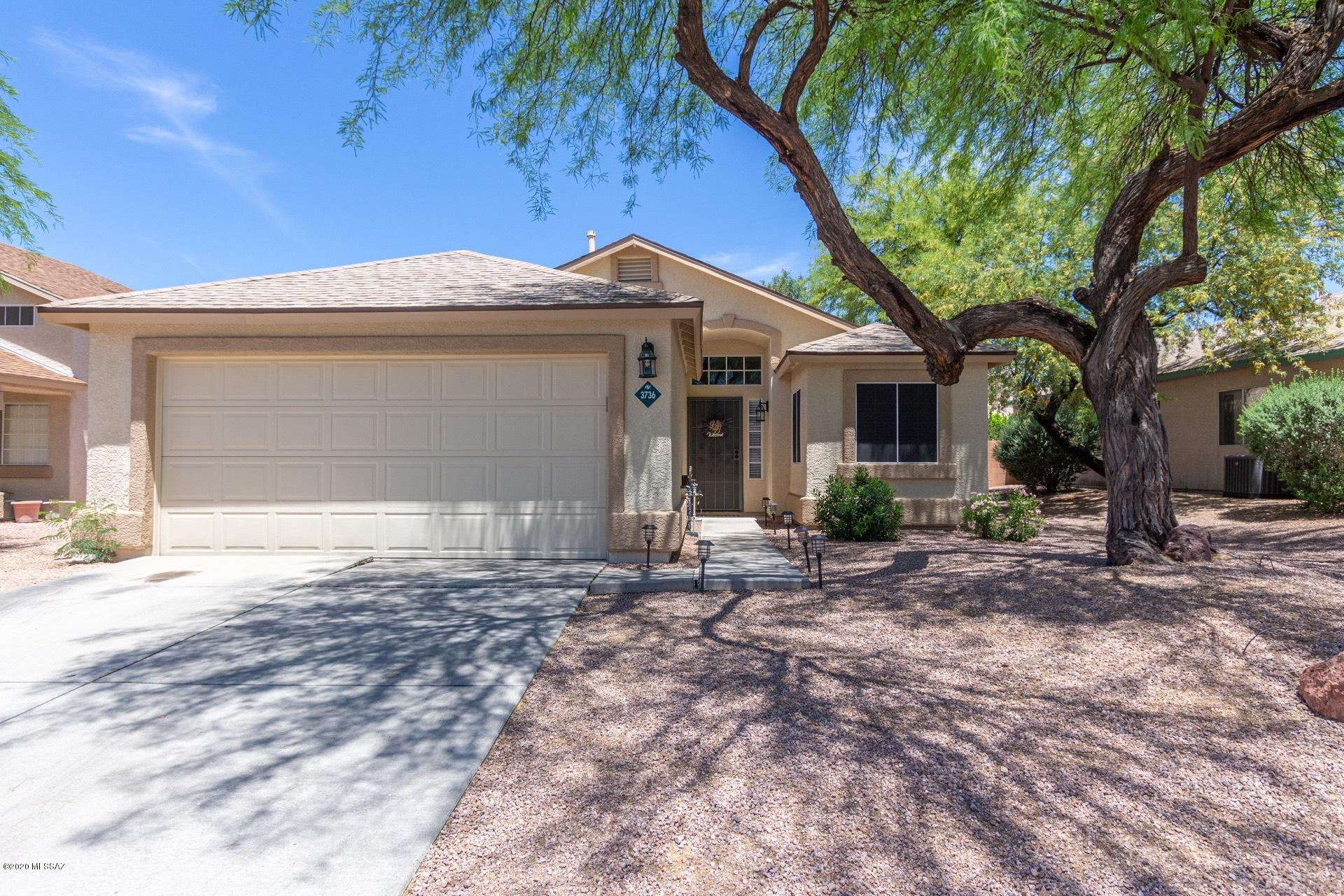 Great opportunity to own a wonderful move in ready home on the northwest side of Tucson. This 3 Bedroom / 2 Bathroom home is located in the Sunnyvale subdivision which is close to shopping, entertainment and easy highway access. The spacious floor plan features vaulted ceilings, new interior paint, new carpet, new laminate wood floors, new granite countertops and stainless steel appliances! The master bedroom boasts an en-suite with private toilet room and walk in shower. The kitchen has an eat in breakfast nook, gas range and pantry! The backyard has been newly landscaped and is ready for your immediate move in! NO POLY PIPES AND NEW ROOF!!! Do not miss, it will not last long!