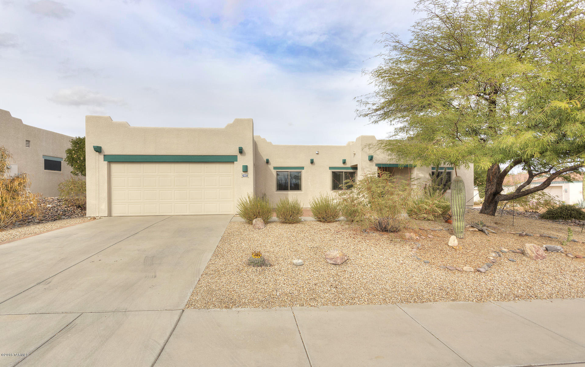 Start living the Green Valley life in this spacious home on a private corner lot featuring a large master bedroom suite with huge walk-in closet and direct access to the back patio, two separate living areas, and ceramic time throughout. Included are a spacious kitchen with plenty of counter space and cabinets, laundry room off kitchen and storage room in garage. Back yard offers plenty of privacy for enjoying Green Valley's fine weather.