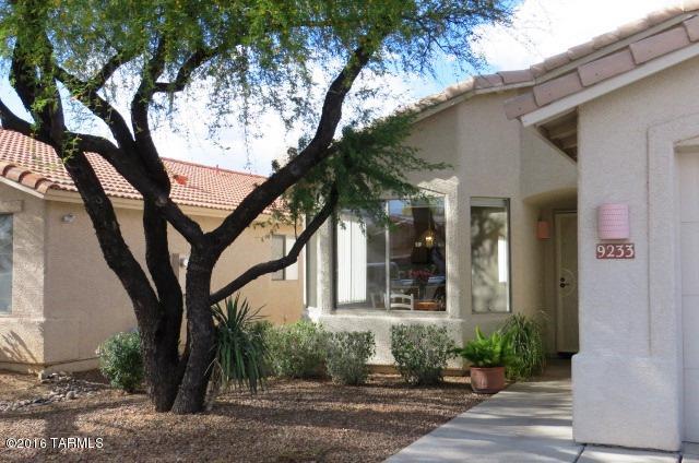 Former Model Home on Premium Lot, backing to majestic Catalina Mountain views and no neighbors behind! Over-sized Master Bedroom features a large bay window to enhance the beautiful view to greenspace and mountains. HVAC & Water Heater are newer! Special feature: Bedroom 4 adjoins Master, and also has a separate entrance. Perfect for an inviting home office or nursery. *Desirable Ceramic Tile and Wood Flooring *Alarm Installed *Wrought Iron View Fencing *Surround Sound Speaker System in Great Room and Master Bedroom *Extra-deep shady covered patio *Great Room with Sunny Eat in Kitchen *Laundry with Sink and Extra Cabinetry *Desirable N/S orientation with Great Room and Master on the north side to help keep you cool. Popular eastside neighborhood in convenient location, with low HOA dues