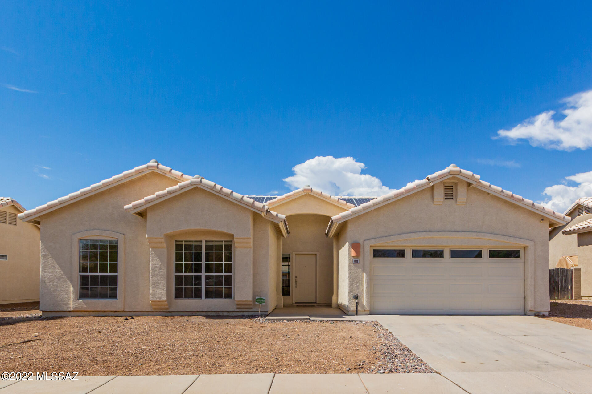 Large 4 Bedroom 2 Bath with vaulted ceilings and bay windows. Bright open floor plan with formal living and dining room. Kitchen with lots of cabinets, counter space, and raised breakfast bar opening to the family room.  Tiled wood burning fireplace in the family room will surely keep the chilly desert nights at bay. Master suite includes walk-in closet and soaking tub, separate shower, and dual sink vanity.  Generously large backyard with turf and low care landscape! New Roof.  Award Winning Vail School District.