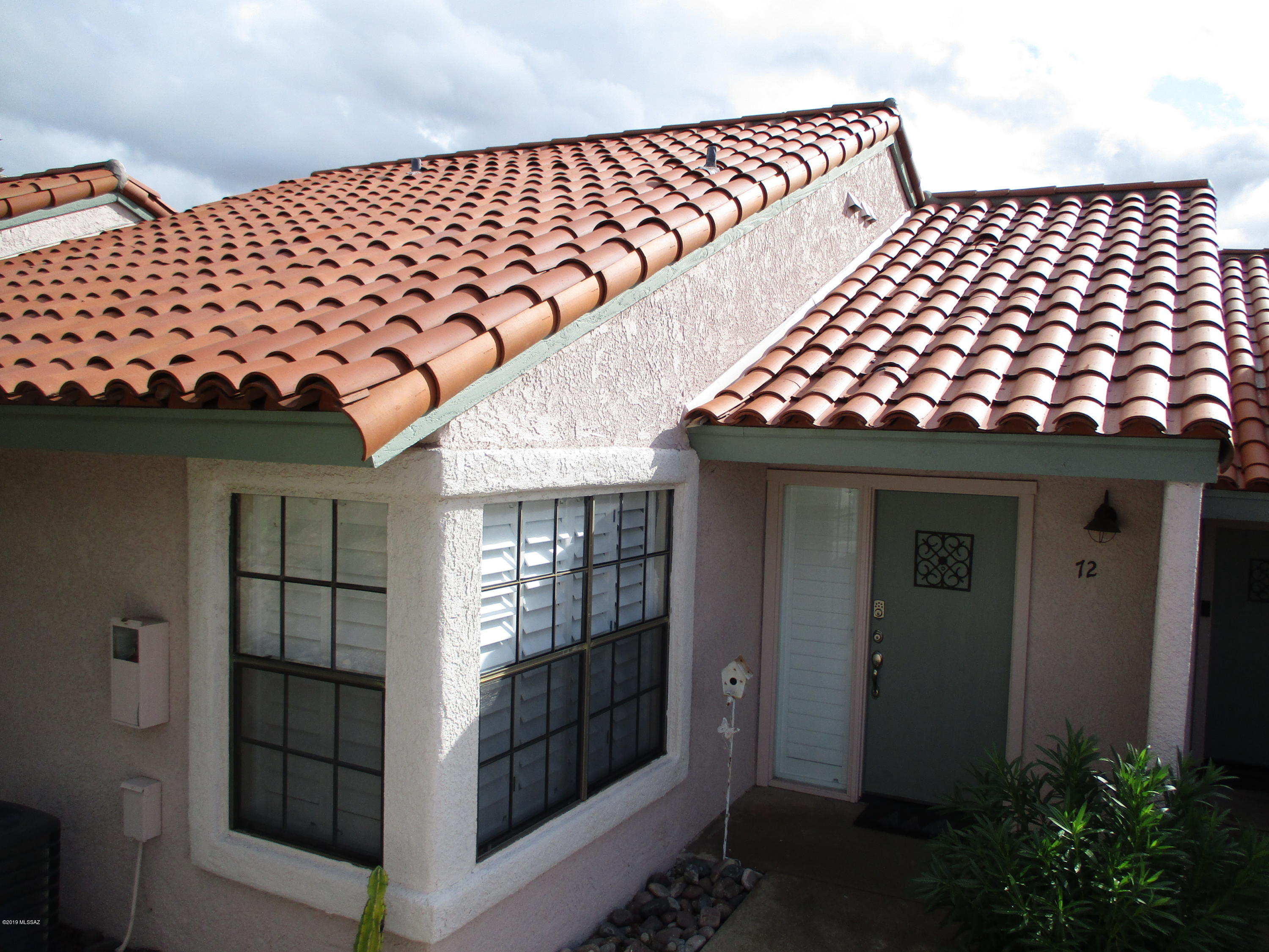 Tastefully remodeled 1 bed/1 bath condo.Bright and airy contemporary interior. Freshly painted, new flooring throughout, new wood shutters in all windows. Enjoy the view of the spectacular Catalina Mountains from the privacy of your own patio. Keep warm this winter enjoying the fireplace in the living room or if it is a nice sunny Arizona day relax at the community pool (heated from November to March) or at the spa. Play at the tennis courts or exercise at the gym.  Within walking distance you will be able to find great restaurants, coffee shops, gelato parlors, world class shopping, art galleries, a grocery store, 
the  pharmacy or a bank. 
HOA covers exterior maintenance,roof, fire protection, structural insurance,garbage collection, exterior pest control, common areas and landscpng.