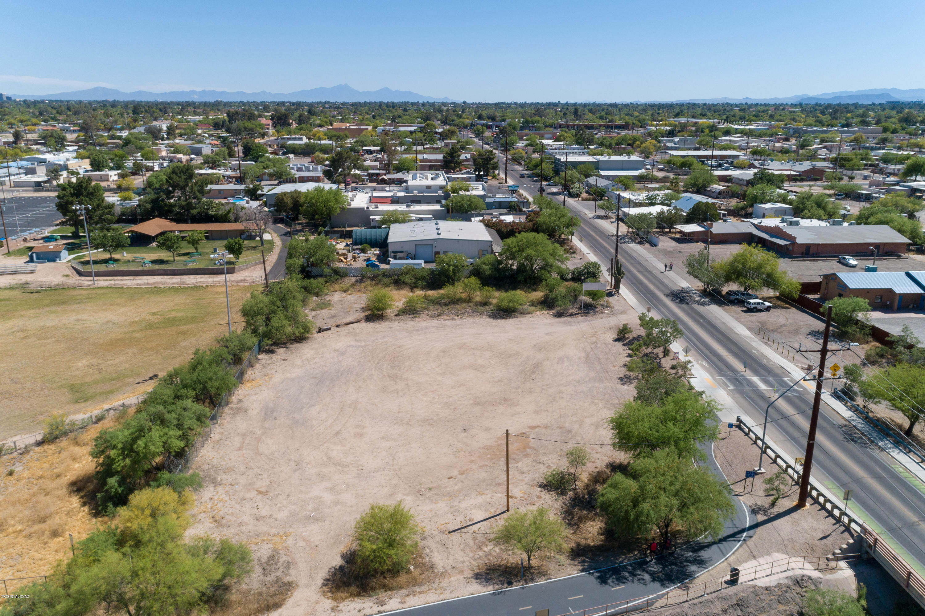 Development opportunity in North-Central Tucson. 1-acre lot that's zoned C-3 which enables a wide variety of uses. Nearby River Rd allows for easy east/west access, and the lot's close proximity to Ft Lowell ensures a steady flow of traffic in the area. The Rillito River to the north and the park to the east create a rural feel, while still being in the heart of Tucson.