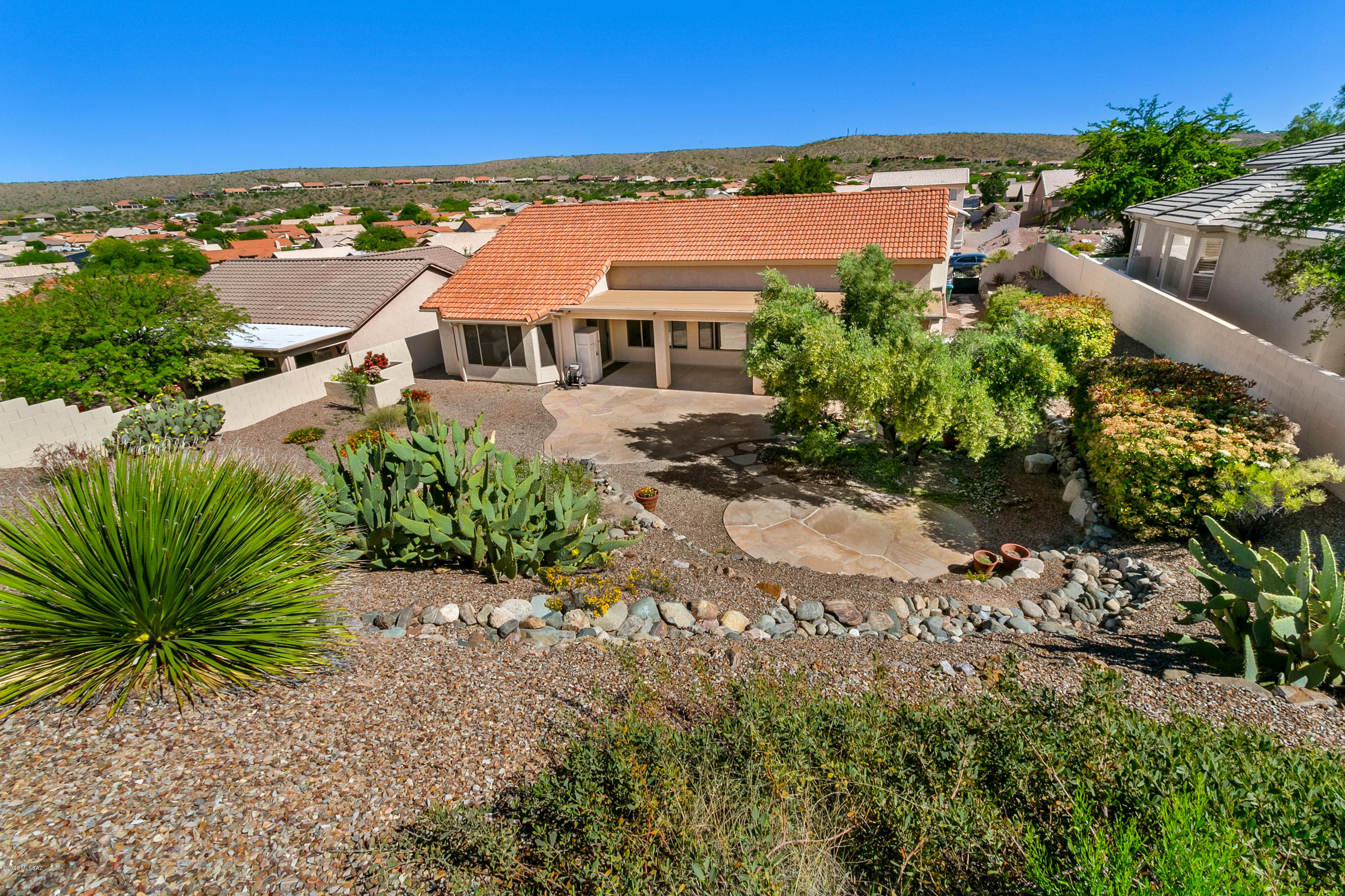 Come see this lovely Montana home in SaddleBrooke, Tucson's Premier Active Adult Retirement Community. The original owners have updated the kitchen with soft-close Alder cabinets, Quartz countertops, under cabinet lighting, nearly new stainless steel appliances, HVAC replaced in 2017, irrigation system replaced 4 years ago, extended garage, sink in garage and garage storage cabinets, built-in cabinets in the den, closet organizer in master closet, gas stub-in for BBQ on patio, very private backyard, Murphy bed in one of the guest bedrooms, ceramic tile throughout,and the list goes on.