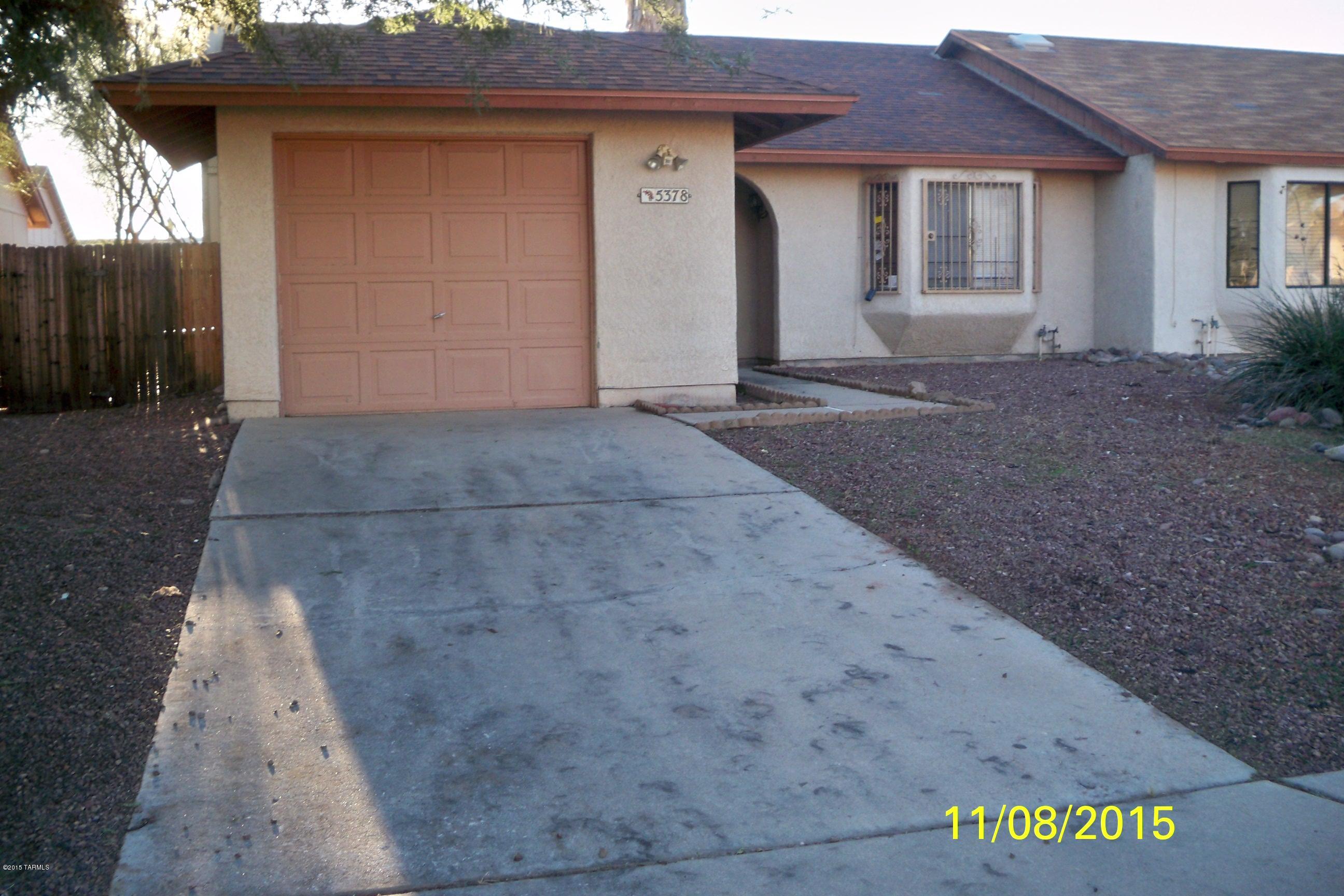 Nice starter home in Midvale Park!  2BR/1BA town house, vaulted ceilings, large family room with fireplace!  One car garage, fenced yard with a covered patio!  Lender owned property.
