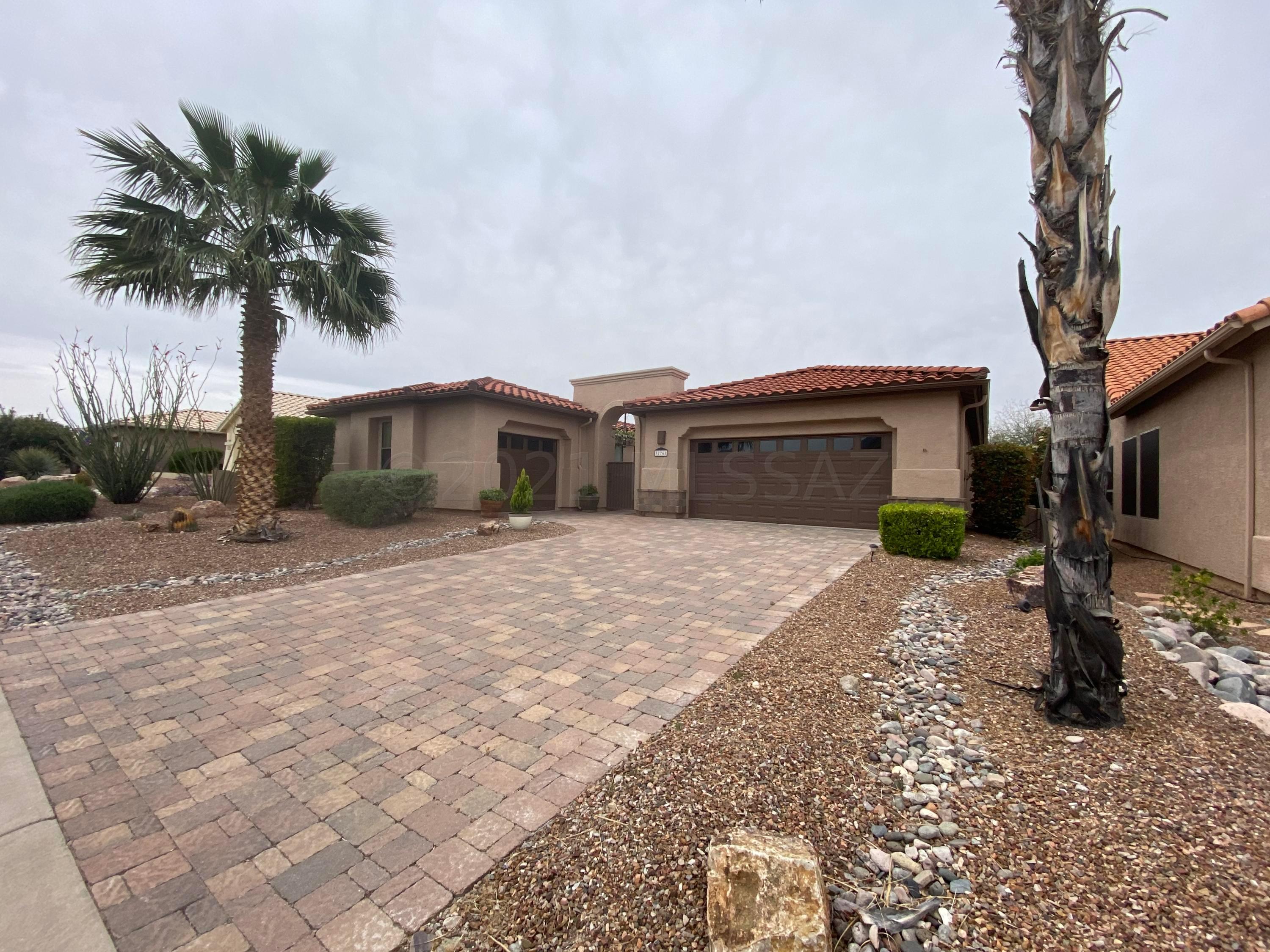 Come and check out this beautifully maintained home with a private courtyard and paver lined driveway. 2 bedroom, 2 bathrooms and an office in the main home with a 1 bedroom, 1 bathroom attached casita off the courtyard. Custom gate and entry door add to the architecture and aesthetics of this move in ready home. Some furniture and fixtures included to get you started on your journey to an active retirement. Golf course views backing up to hole 12. Wave to your neighbors with your morning coffee as they drive by on their golf carts or check up on your home while you're enjoying your own game. Built in BBQ in the backyard makes for easy entertaining. Plantation shutters for security and style. Come and preview your new home!