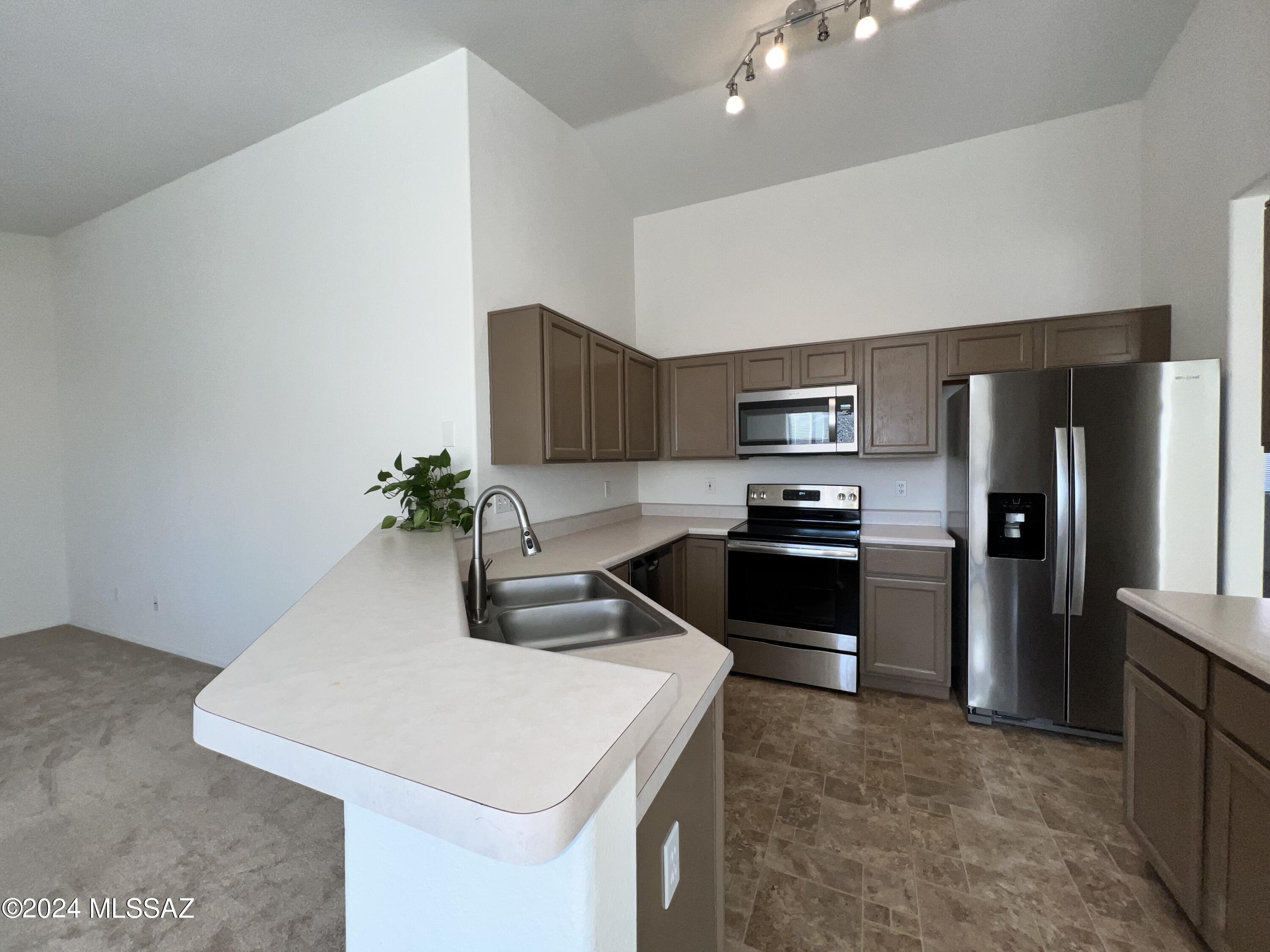 Located on the Eastside this 4bdr/2ba home offers a living room, dining area, family room, kitchen w/eat-in nook, stainless steel appliances, gas range and counter seating.
Spacious primary bedroom w/ensuite features walk-in closet, dual vanities, linen closet and tiled shower!
Fabulous backyard w/ mountain views, pavers and artificial turf.
Two car garage, fenced backyard, corner lot, and laundry room includes W/D.