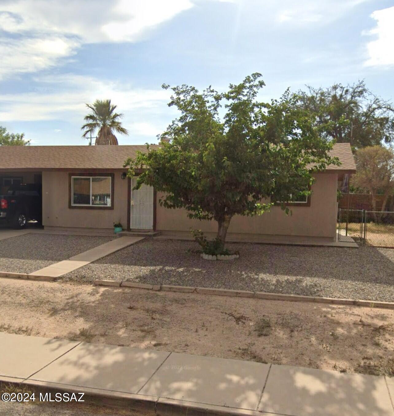 Beautifully renovated duplex inside & out! In town with newer A/C & heat. Fenced yard, carport, new floors, paint, toilets & appliances. Too much to list. Come see!