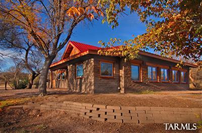 1,742sf restored MUD ADOBE RANCH home c.1920 on 2.7 acres adjacent to NATURE CONSERVANCY & AUDUBON's PATTON HOUSE birding site! High ceilings & authentic rustic finishes; a bright corner Kitchen; 2 full Baths; GrtRm w/mineral-rock FP + adjacent Study & walled CtYard. ALSO includes (2) 500sf guest apartments, each w/Kitchen & Bath + outside LndryRm: IDEAL for friends & family OR use them as full-time or overnight guest rentals. Exceptional B&B, ECO or BIRDER'S RETREAT, SPA potential here! Ample area for more cottages or bldgs; horses & barn; a garden, art studio.. Exceptional nearby hiking & ride-out. Tucked away yet a short walk into town. ENJOY Patagonia's new OPERA HOUSE, nearby Wineries, Fairgrounds, sparkling LAKE PATAGONIA & myriad historic sites. Adjacent acreage also for sale. Wow!
