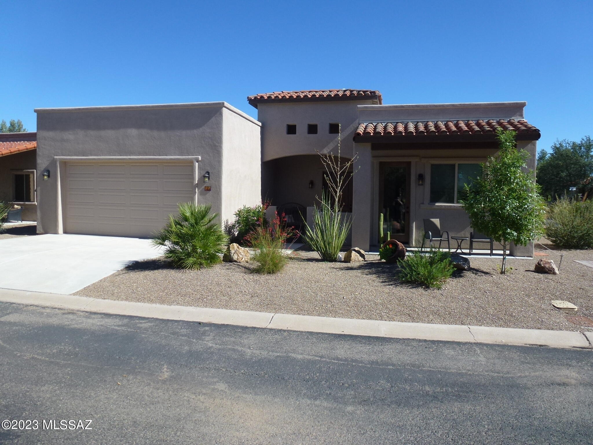 Move in ready, this beautiful and gently used (2020 built) Double E Builders custom home on a (cul-de-sac) corner lot in the Sanctuary at Tubac Golf Resort is ready to go.  Cozied up to common areas on two sides this home features 2 BR, 2 BA in the main home with an adjacent 1 BR, 1 BA attached Casita (workshop/hobby room, office etc). Fabulous tile floors, fireplace, finishes, window coverings and accents throughout.  Kitchen showcases stainless appliances (side by side refrigerator, gas range, microwave) , double sink, custom cabinets and granite counter tops.  Large laundry room with washer and dryer.  Simple landscape and hardscapes for easy care (lock and leave). Perfect for outdoor living and entertaining. All furniture available on a separate bill of sale.