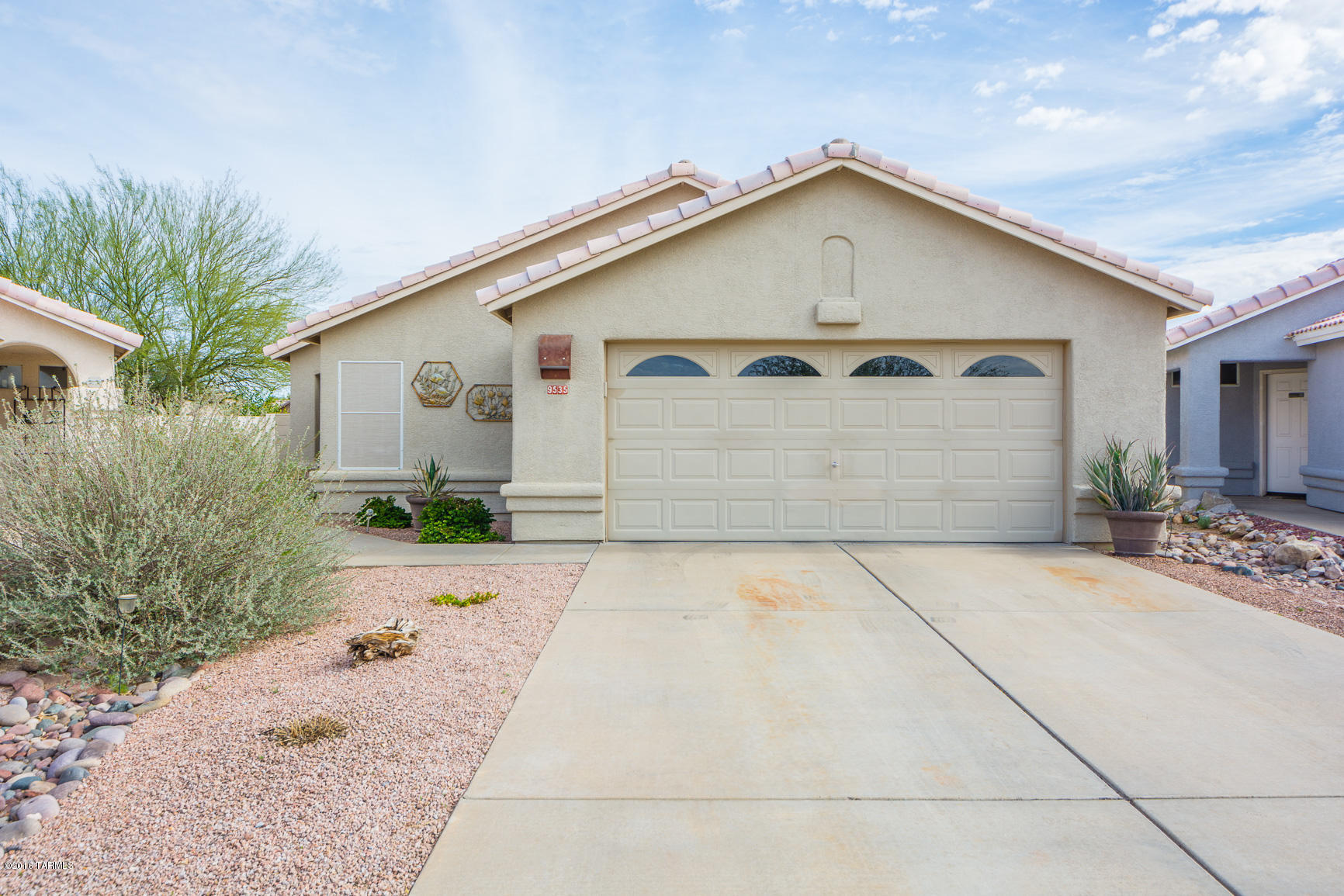 What an amazing home! You will fall in love with this beautiful home that has all the best in upgrades.As you walk up to this home you will notice the beautiful stained glass greeting you. The Kitchen WOW what can I say but w/granite & LG stainless steel appliances, you will fell like a chef. 13' tile on the diagonal, through out the great room updated lighting fixtures, & ceiling fans. All bedrooms have bamboo flooring and wood blinds. Huge over sized private NE facing backyard with custom pebble-tec pool with stone surround,& extended flagstone patio.Trane high efficiency HVAC 2011, water softener. Transferable termite warranty. Award winning Vail School District! Walk to the park & dog park.  This home is an amazing GEM in rita ranch don't miss this one! Come see it today.