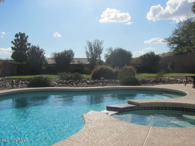 Fabulous property in gorgeous Rancho Vistoso! Huge backyard oasis with fenced pool/spa, tons of room to play, lots of lush grass with children’s play equipment and amazing Catalina Mountain views! This split bedroom floorplan is full of charm, upgrades 3 car garage. This is a must see! Includes all appliances, pool service and quarterly landscape. Quarterly landscaper service for large vegetation trimming and irrigation system repairs. Tenant responsible for maintaining grass and low lying vegetation. Pets are subject to approval. *** RENTAL RATE REFLECTS A $45 CONCESSION IN EXCHANGE FOR TENANT’S AGREEMENT TO CHANGE HVAC FILTERS MONTHLY. RENTAL RATES ARE $45/MO HIGHER THAN STATED W/O CONCESSION. ***