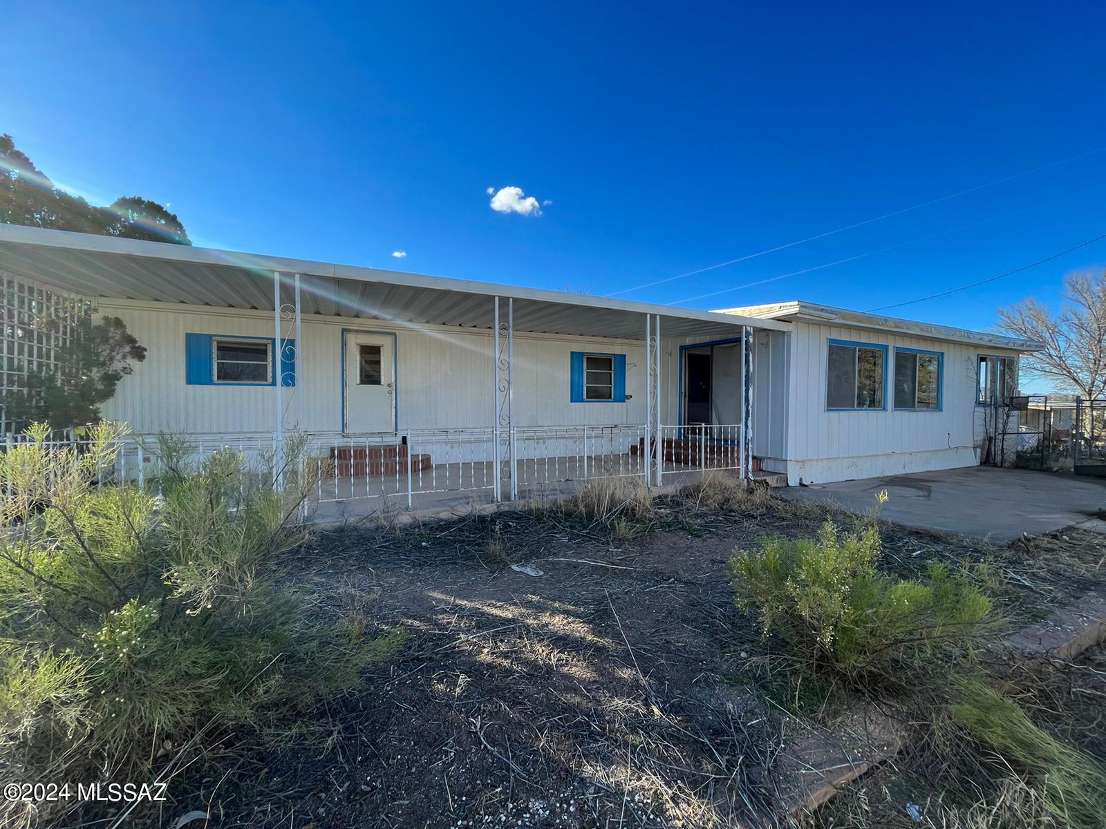 Handyman special with new roof installed February 2024.  The roof covers full length Arizona room as well!
