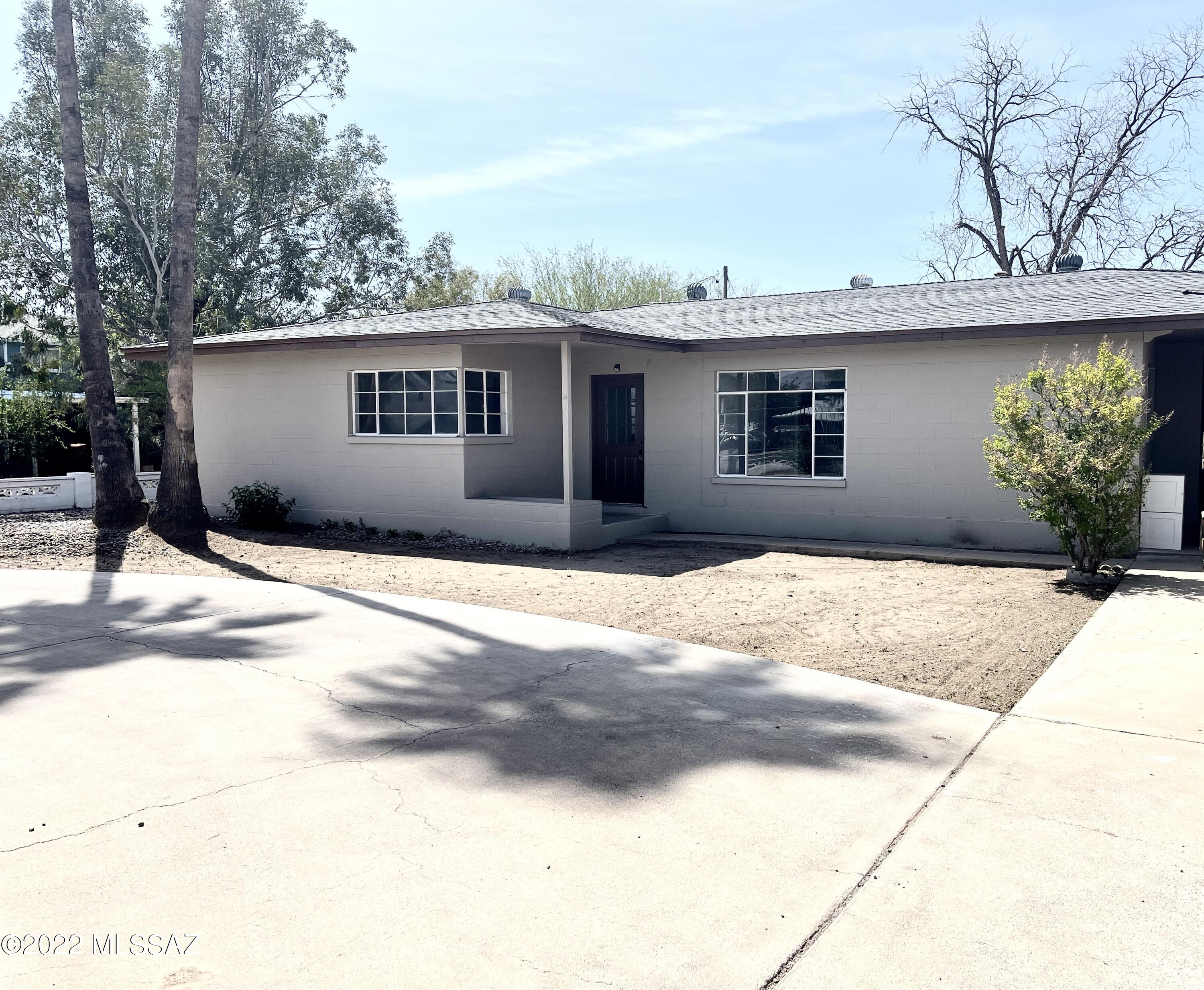 Come see the fresh updates in this well built home in one of the most established areas of Safford.  New paint, flooring and fixtures.  Large enclosed AZ room is heated and cooled which adds to the sq footage of this nice sized family home.  Lots of extra storage in the two back work rooms.  Bring your ideas to the enclosed backyard which includes raised bed for gardening or a dog run.  This home is close to schools, shopping and dr's offices.  Come see this charmer and add your own touch to something that is not like all the others.