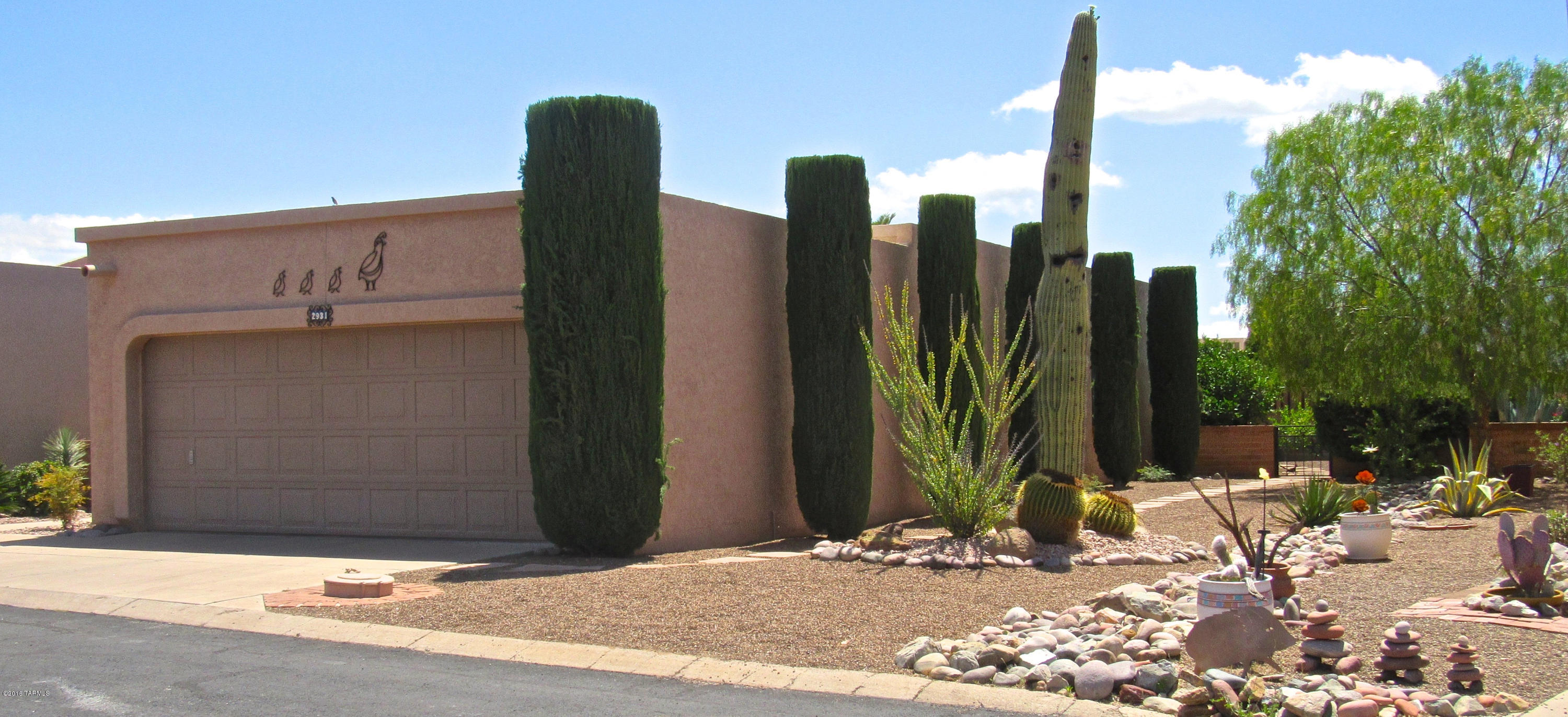 If tasteful Southwest decor is your preference, your search is over!   Located in Desert Hills V, this cozy 2 bedroom, 2 bath home is light, bright, and move-in ready. It has been totally updated and features granite counters and back splash in kitchen, coordinating paint colors, and new 16 x 16 tiles throughout.  Being sold completely furnished--furniture, decor, linens, kitchen items--just as pictured.  Enjoy Arizona living from inside and outside on your very private patio with a peek-a-boo mountain view. The entertaining area is cozy for a small group of family and friends and yet there is ample space to host a larger gathering.  Property is conveniently located near golf and GVR facilities.  Great winter residence, year-round home, or investment property. Furniture conveys on SBOS.