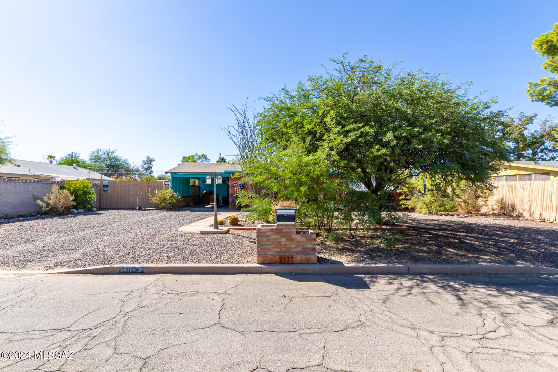 CALLING ALL INVESTORS!! **OPEN HOUSES 12/12 and 12/13 from 10am to 12pm** This home is located in the Garden District on a 0.34 acre lot, with a large pool, and it features 2074 square feet of living space. This 1954 gem is bursting with charm: paver flooring in several of the living areas, a brick fireplace in the front living room and a wood burning stove in the back family room. There is a garage and workshop with power and water, waiting to be turned into an ADU or pool house. Plenty of room on the lot, including multiple yard areas and options for parking an RV. A massive covered porch in the backyard currently homes a pool table, and can easily be transformed into your outdoor oasis. This home is waiting for it's next owners to put their personal stamp on it!