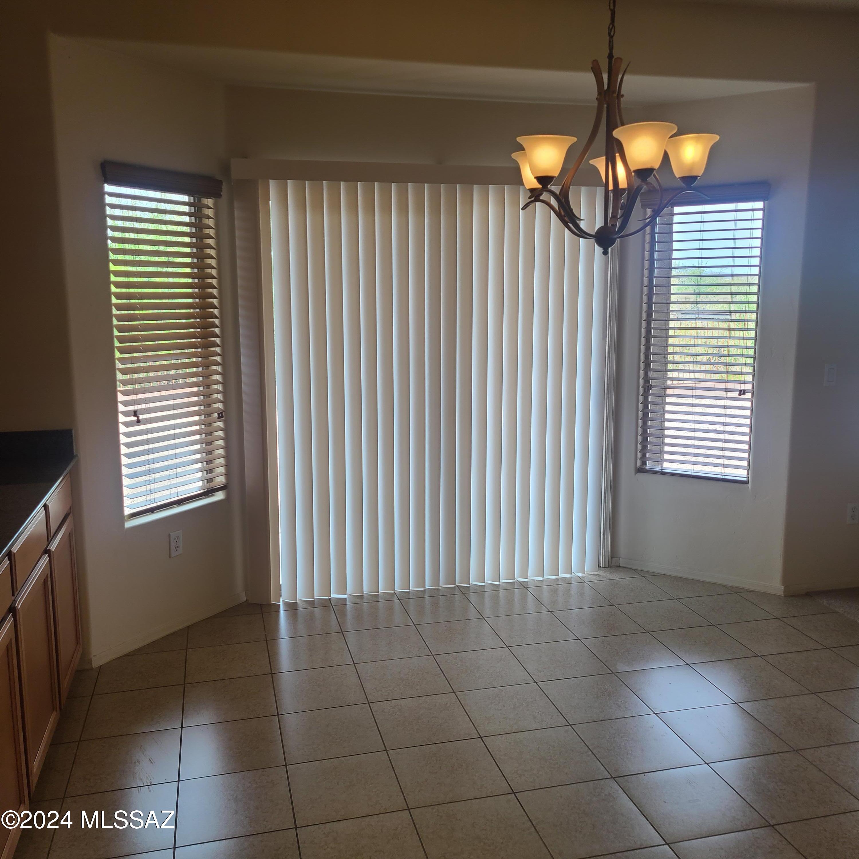Directly across from Park!!  Very Spacious Great Room, all kitchen stainless steel appliances, granite counters, split floor plan, extra den area, large backyard, backs up to desert so great views & private.