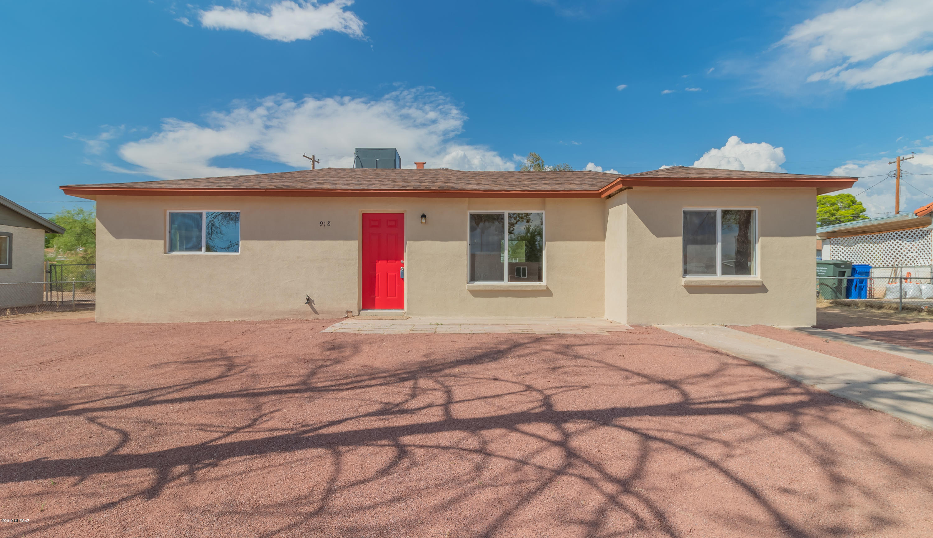 Seller will accept or counter offers from 149,900-154,900. Welcome to this gorgeous home located in Southwest Tucson! This home offers a new roof, new windows, and new AC! Upon entering you are greeted with wood style flooring. The living area is the perfect size for entertaining or relaxing with the family! Create a great meal in your open concept kitchen and enjoy new stainless-steel appliances! This home beams with natural lighting and the simple color palette is sure to enhance your belongings from the start! Enjoy a spacious master bedroom with your own master bath! Appreciate two additional bedrooms perfect for guests or an office! Step out into your low maintenance yard that is perfect for grilling or watching the kids and pets play!