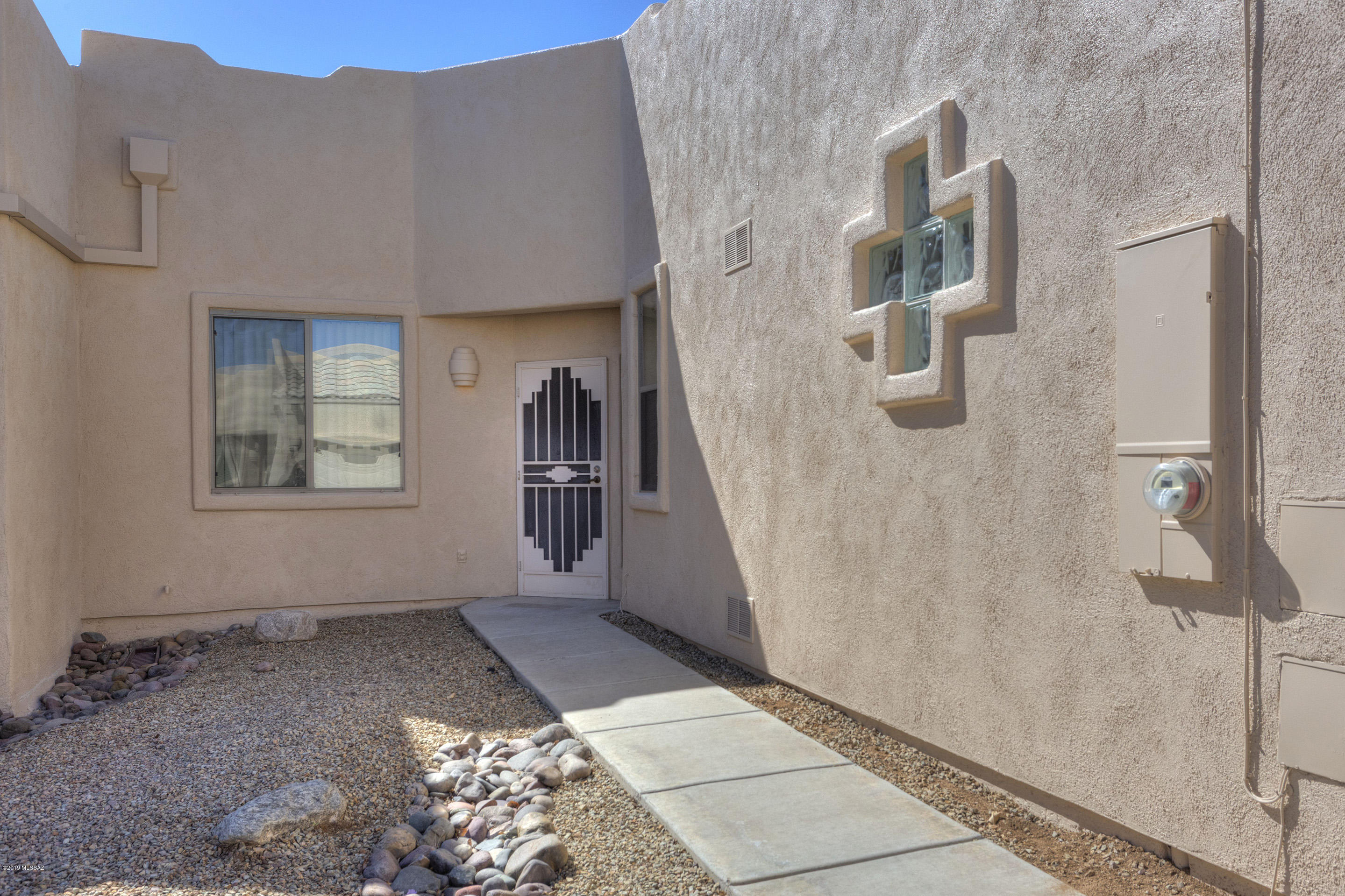 This 2 bed 2 bath townhouse  is ready for you to call home!  The freshly painted interior and exterior welcome you home to this quiet and well-maintained neighborhood.  There is a cozy breakfast nook for your morning coffee and a dining area for entertaining friends.  This townhouse has a large backyard and the patio has been extended with beautiful pavers.   Canyon View is a non-GVR  community with its own multi-million dollar clubhouse, pool, jacuzzi, library, fitness room and kitchen.  There are lots of daily activities to keep you engaged in this bustling community such as potlucks, games, arts and crafts and more.  Canyon View is located in the heart of Green Valley close to shopping and medical centers.