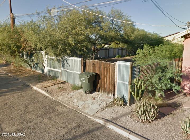 Great land-lot available in the heart of Tucson, awaits your personal touch & inspiration! Located in the Barrio Santa Rosa neighborhood within the iconic Old Barrio.  Fully enclosed 5,278sq.ft lot with mature vegetation. Zoned for residential use. Enjoy playing and using the Santa Rosa Rec Center and Park right across the street! Only minutes away from Downtown, restaurants and entertainment.  Conveniently close the Pima Downtown, The University of Arizona and easy access to the I-10.