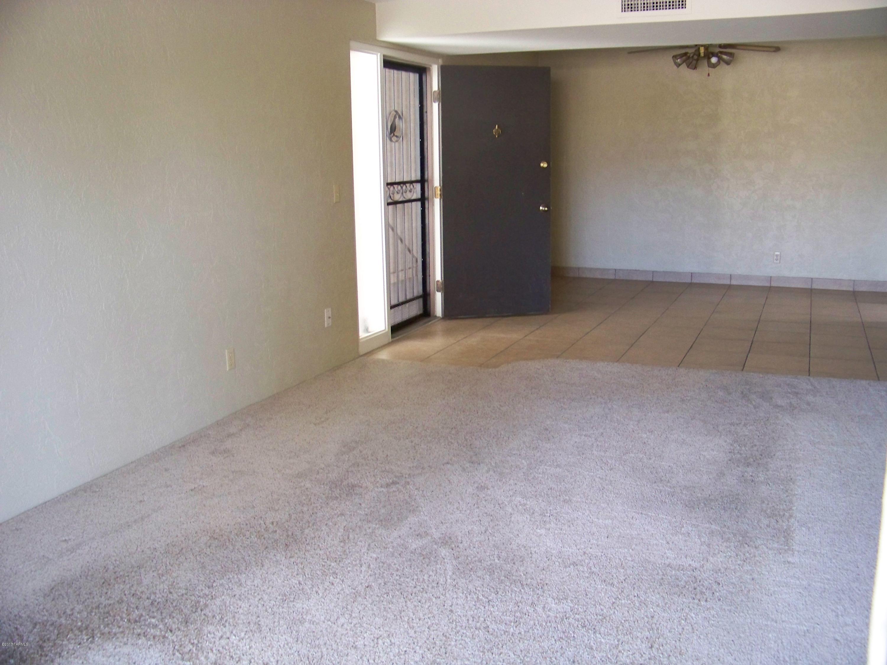 Rare opportunity to OWN in this small, quiet community! Charming 2 bedroom, 2 bathroom condo in the heart of the East side. Recently updated! Carpet in living room and both bedrooms with ceramic tile in kitchen, bathrooms and hallways. Beautiful views from huge patio. Upstairs unit which means no neighbors above you!