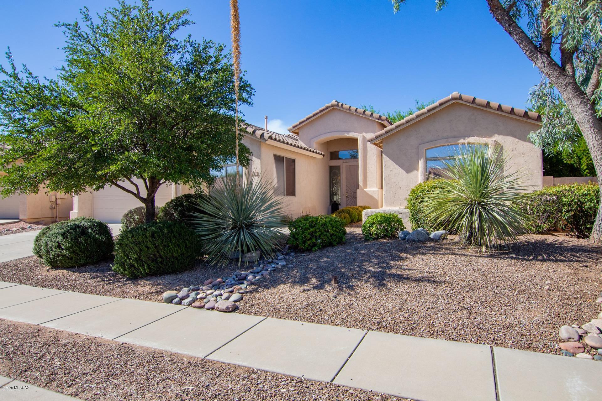 Welcome to The Lakes at Castle Rock Gated Community.  Pristine interior w/neutral palette throughout, large windows, soaring ceilings, beautiful tiled floors, ceiling fans, & plush carpet in all the right places.  Spacious eat-in kitchen features a center island, breakfast bar, patio access, pantry, built-in desk & plenty of wood cabinets.  Master retreat boasts patio access,  private en suite, & walk-in closet. Generous sized bedrooms, ample closets, & 2 baths. Enjoy the extended covered patio, fenced spa, pavered patio, & swaying palm trees.  Community Rec Center, Pool, Laes, Paths, & so much more.