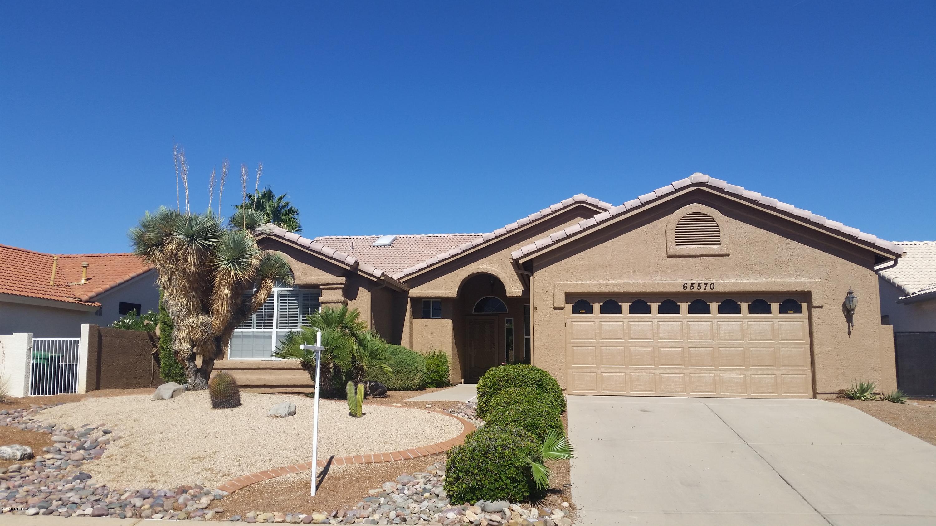 This elegant Estancia features soaring ceilings, formal and informal living and dining areas, an updated kitchen with gorgeous granite and a private, generously sized owner's suite completely separated from the den, guest bedroom and guest bath. The tiered backyard is peaceful and private with covered and open patio areas and there are mountain views from the front. Some recent updates include exterior and interior paint (2018), tile floors in baths and traffic areas, carpet, window blinds, garage door opener, refrigerator and washer. This home had been well maintained, is spotlessly clean and move-in ready.